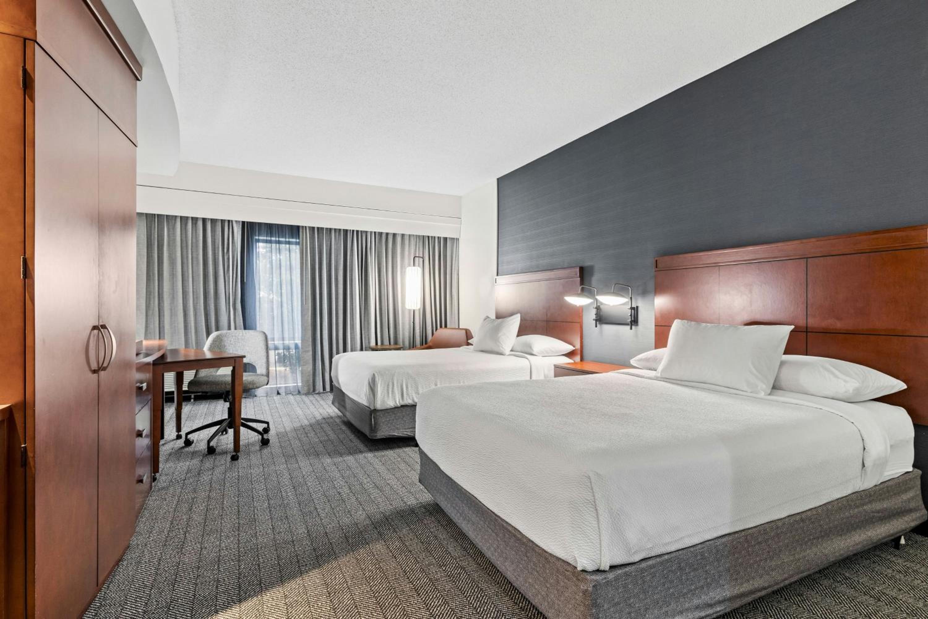 Queen Suite with Two Queen Beds and Sofa Bed