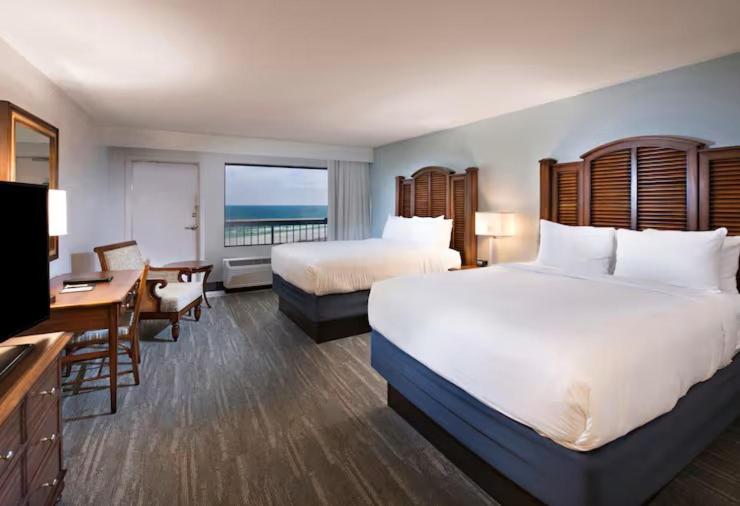 Deluxe Queen Room with Gulf View and Balcony - Photo 1