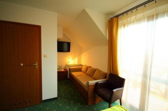 Triple Room with Balcony (2 Adults + 1 Child)