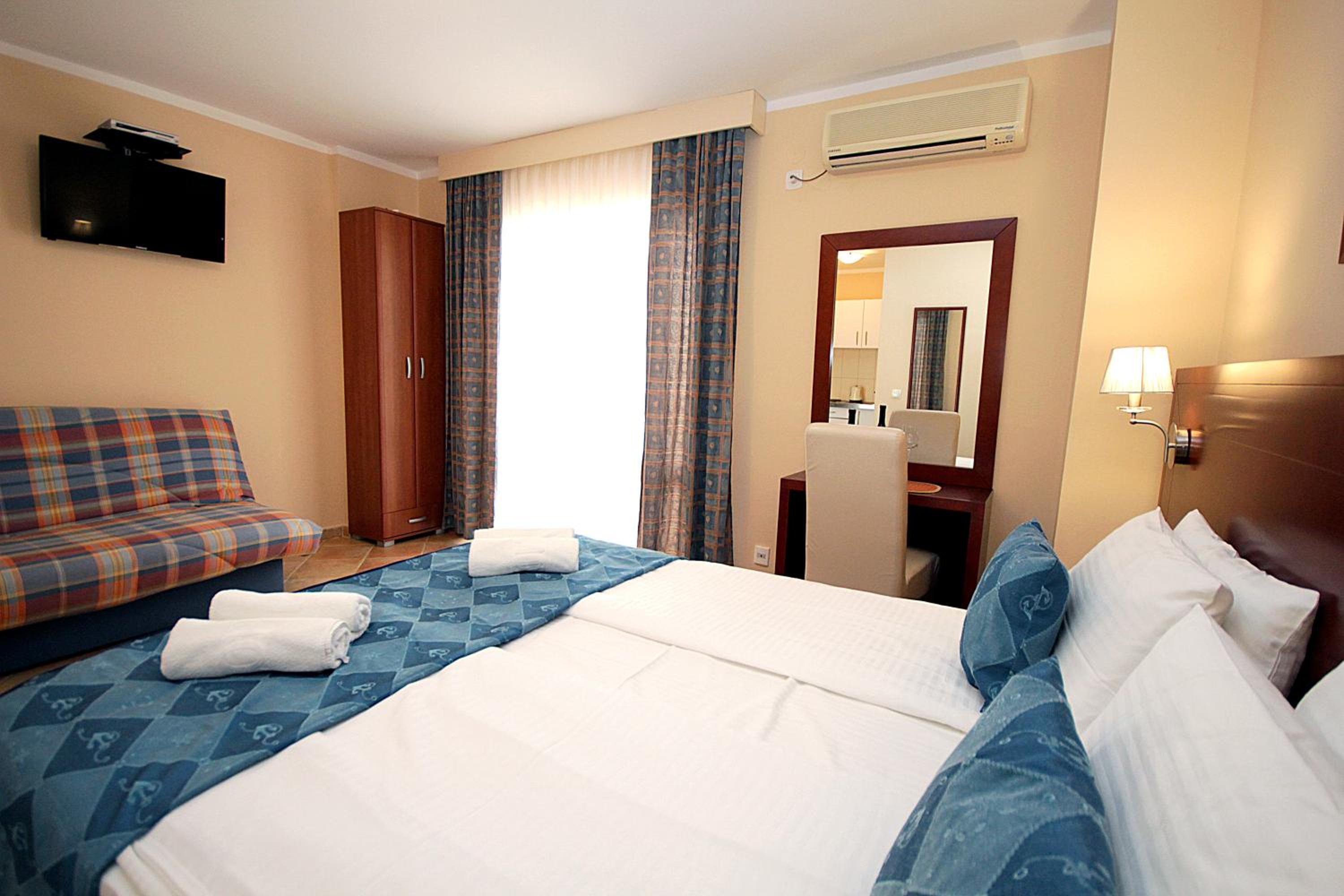 Standard Triple Studio with balcony and Partial Sea View