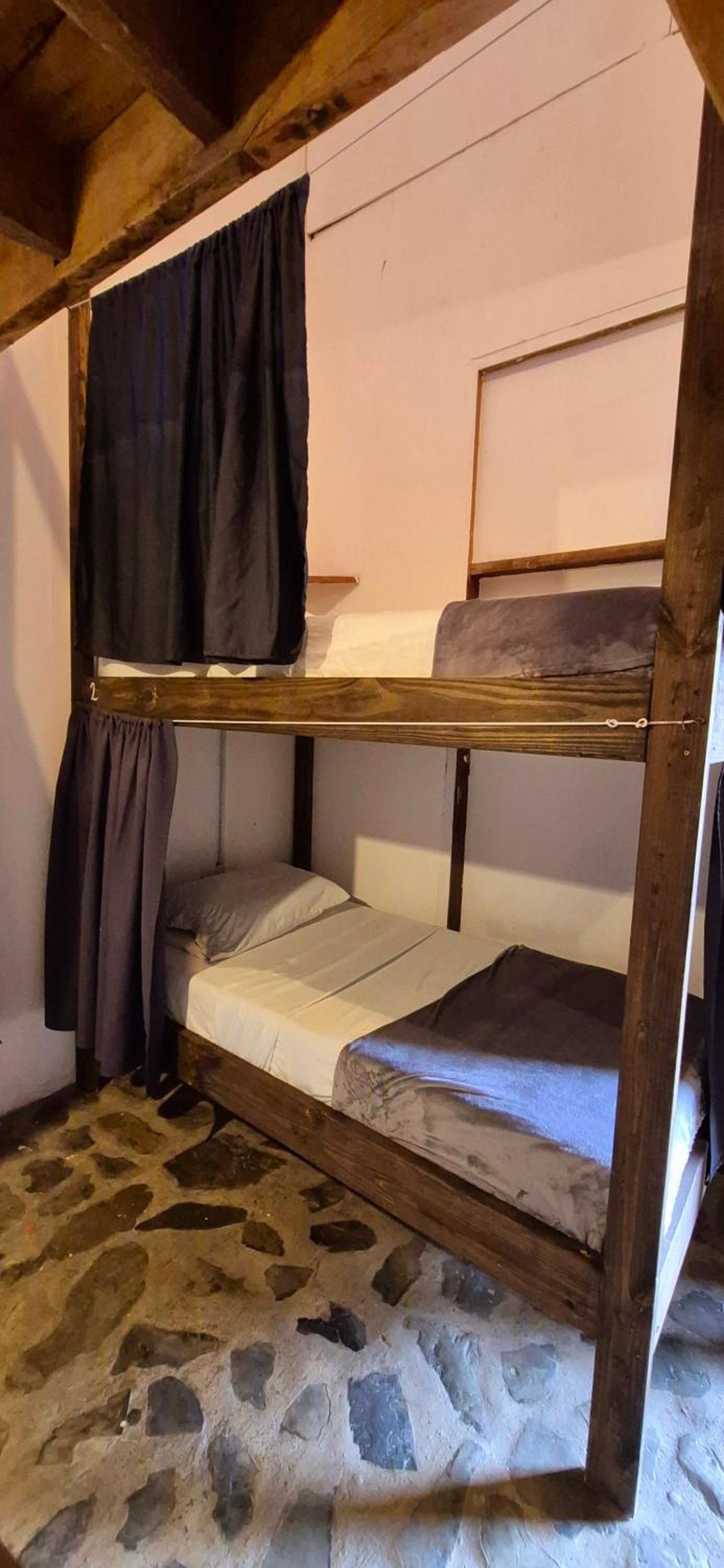 Single Bed in Dormitory Room
