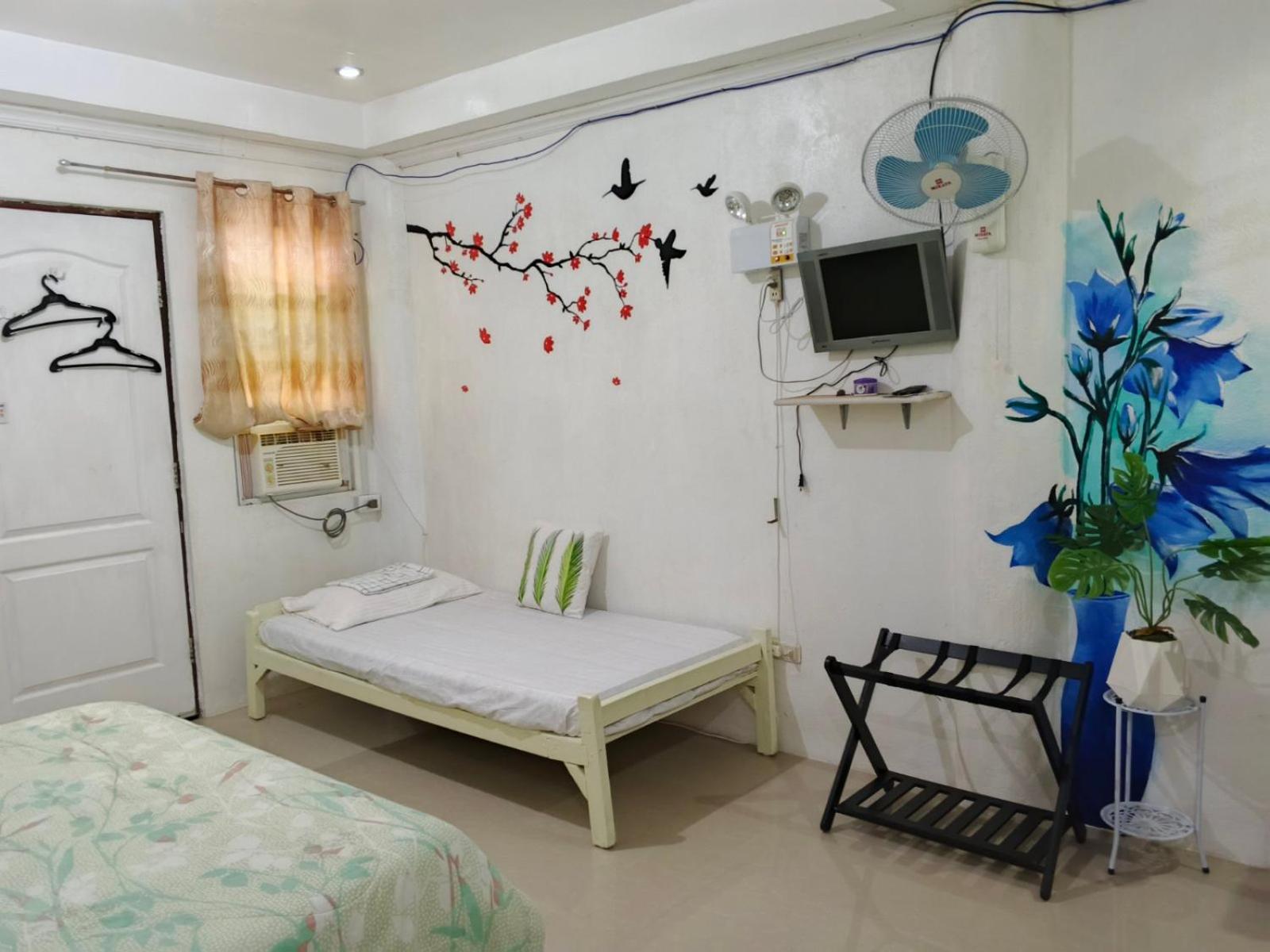 Deluxe Triple Room - Photo 7