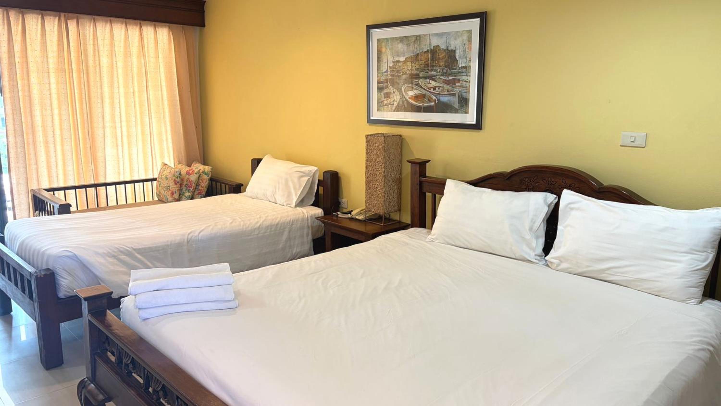 Deluxe Triple Room - Photo 11