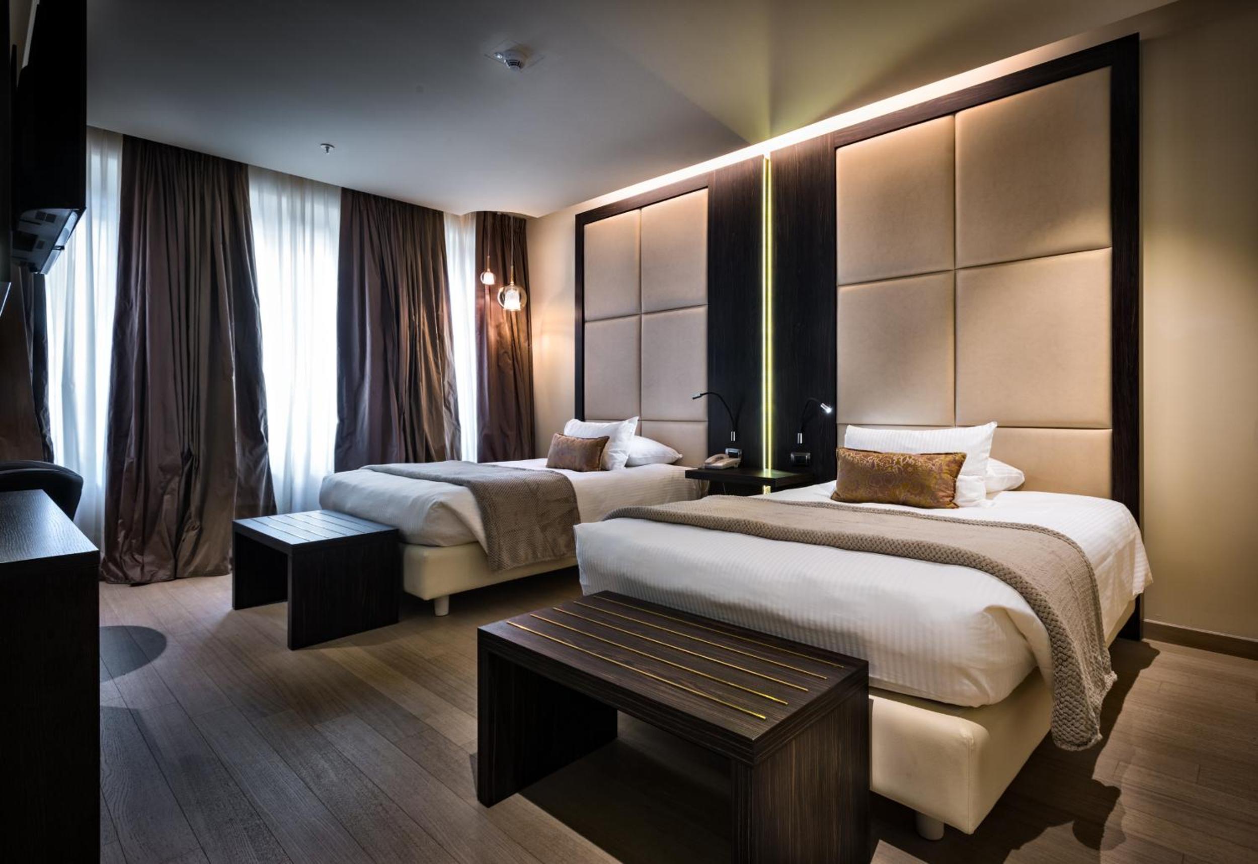Deluxe Triple Room - Photo 8