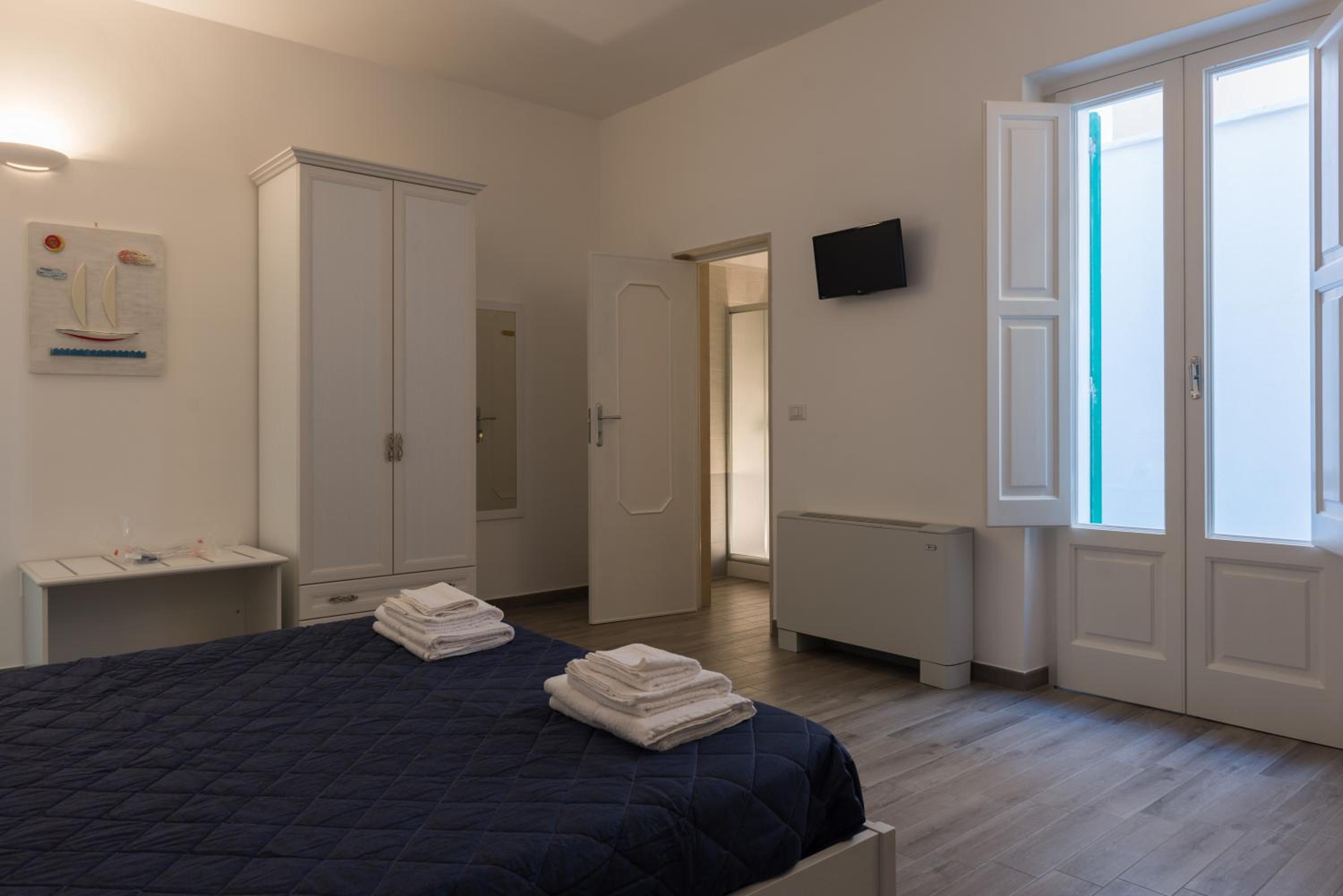 Quadruple Room with Private Bathroom photo 3
