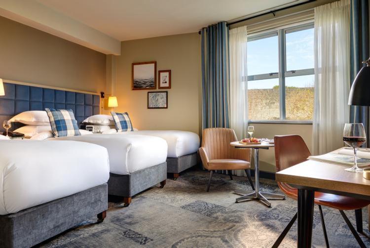 Deluxe Triple Room - Photo 1