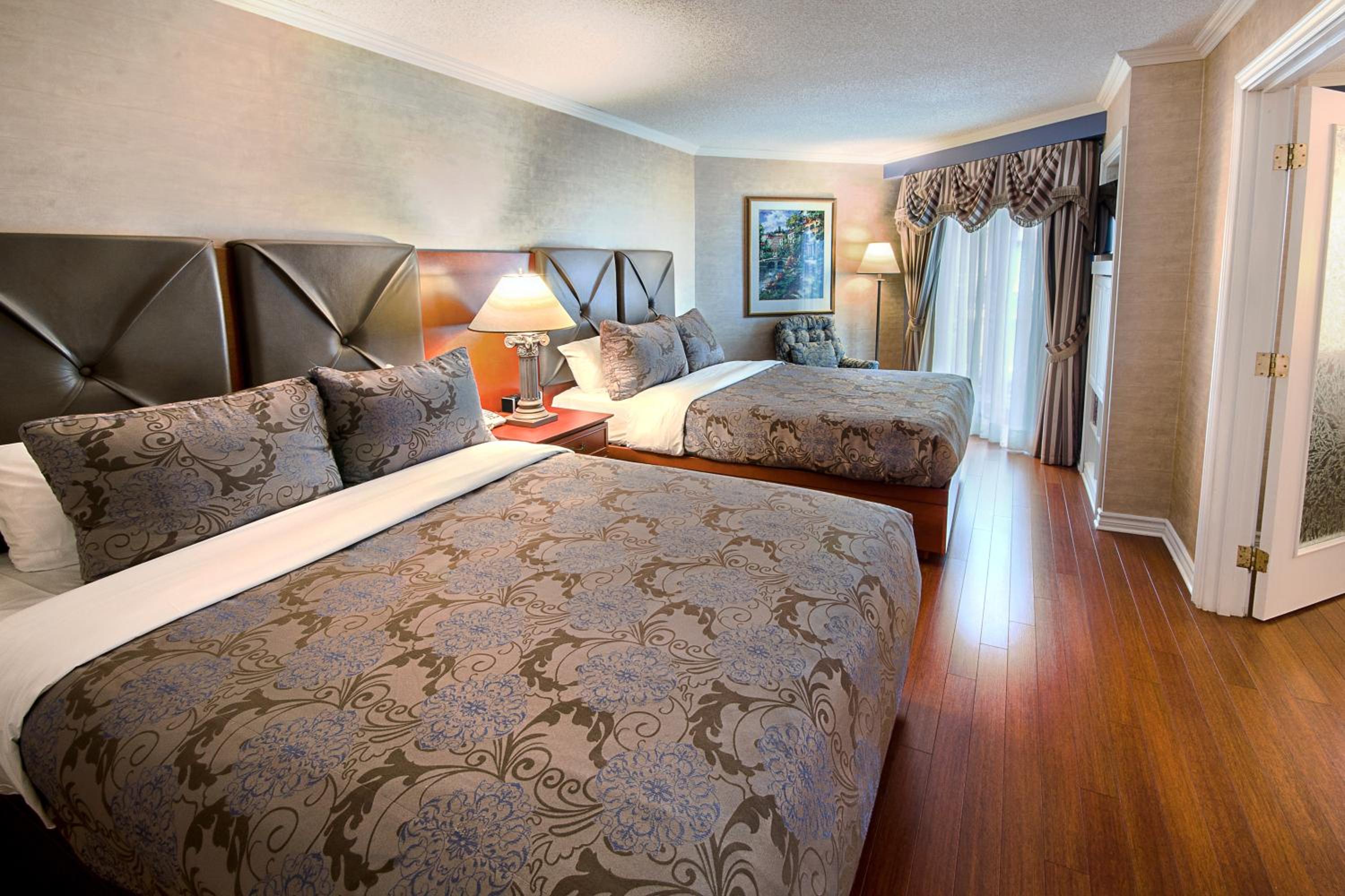 Interior Garden Balcony Family Suite, 2 Queen Beds and Sofa-Bed