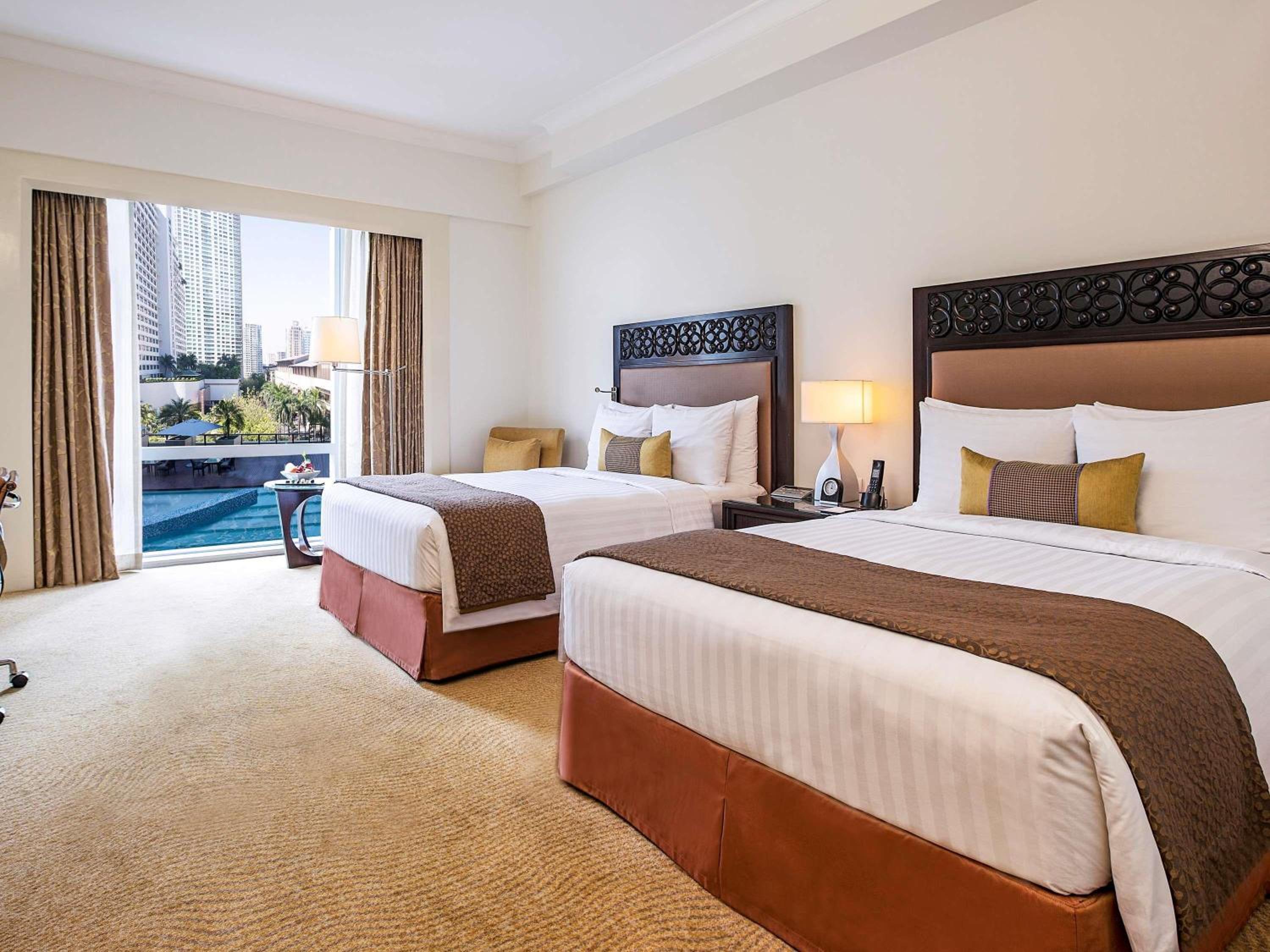 Deluxe Pool View Room with Two Queen Beds photo 3