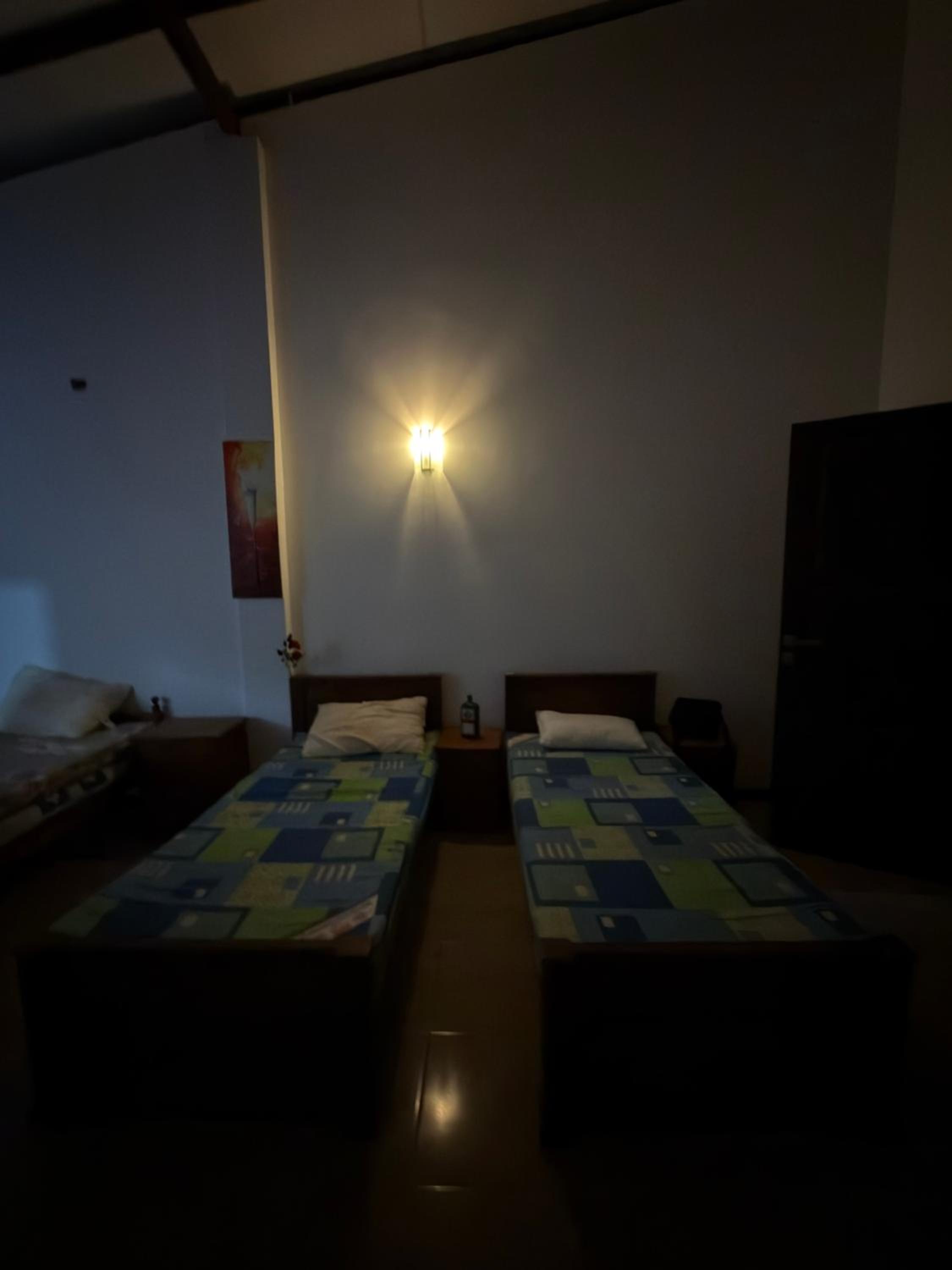 Single Bed in Dormitory Room