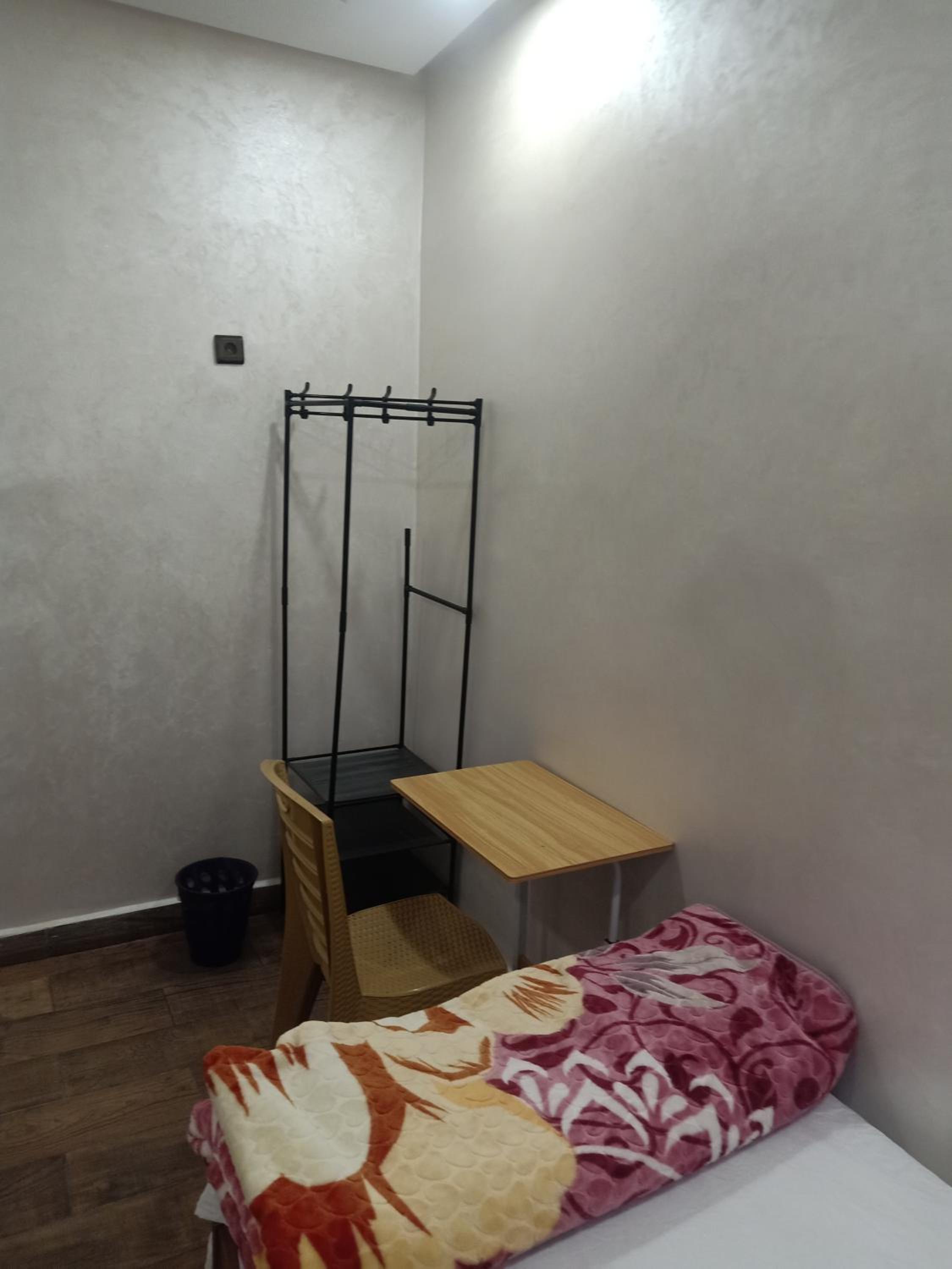 Basic Triple Room with Shared Bathroom photo 2