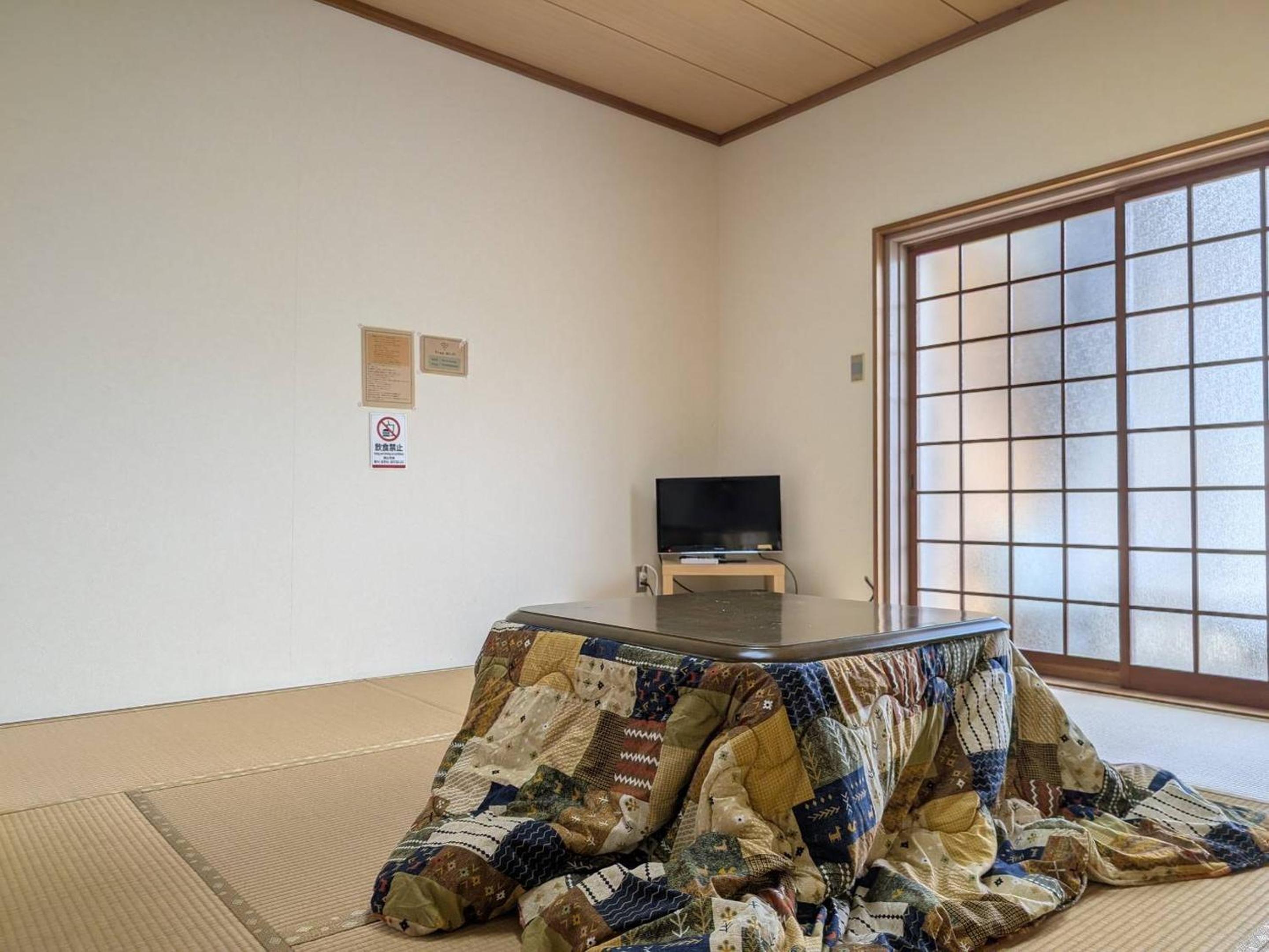 Japanese-Style Quadruple Room photo 3
