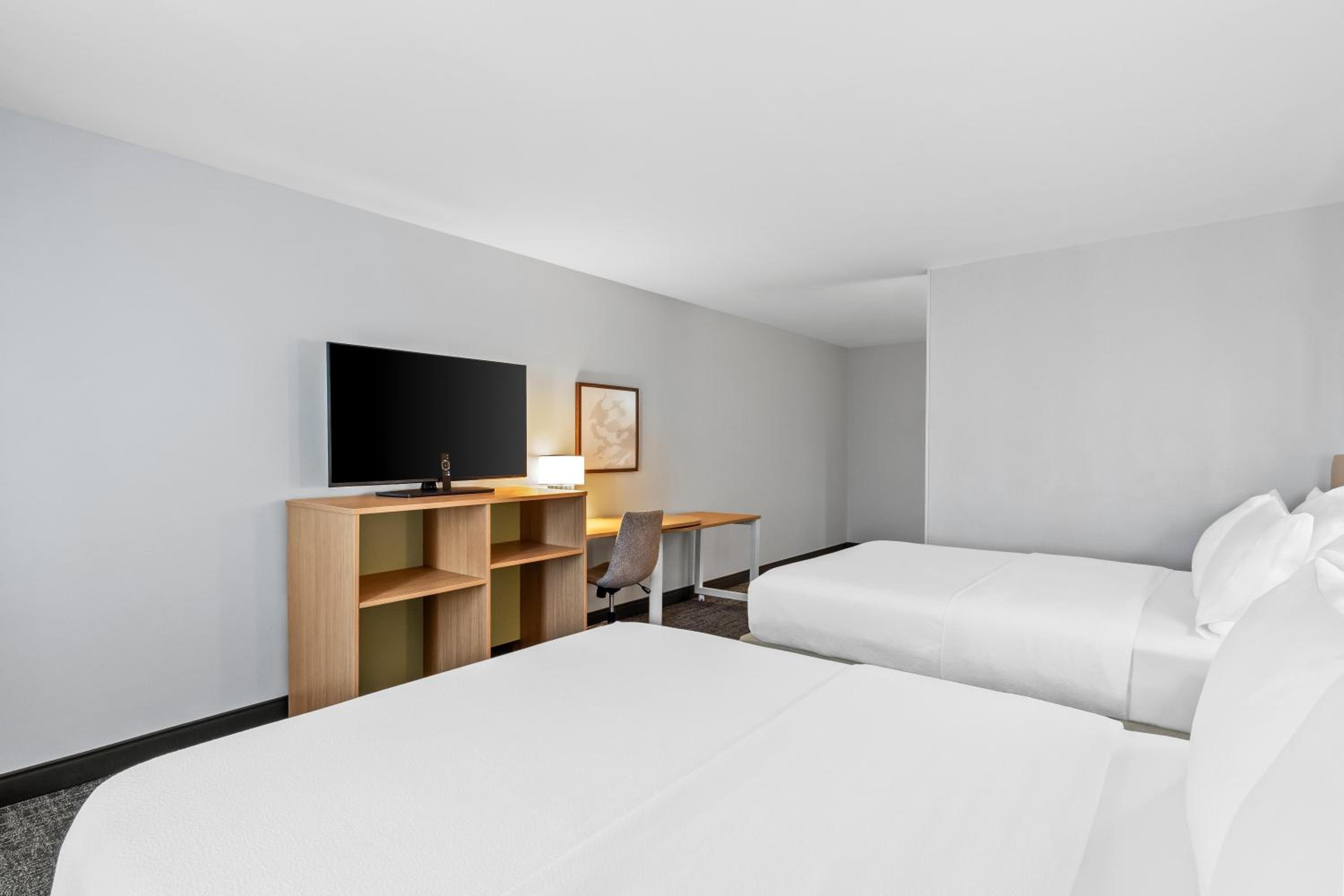 Queen Room with Two Queen Beds and Sofa Bed - Photo 1