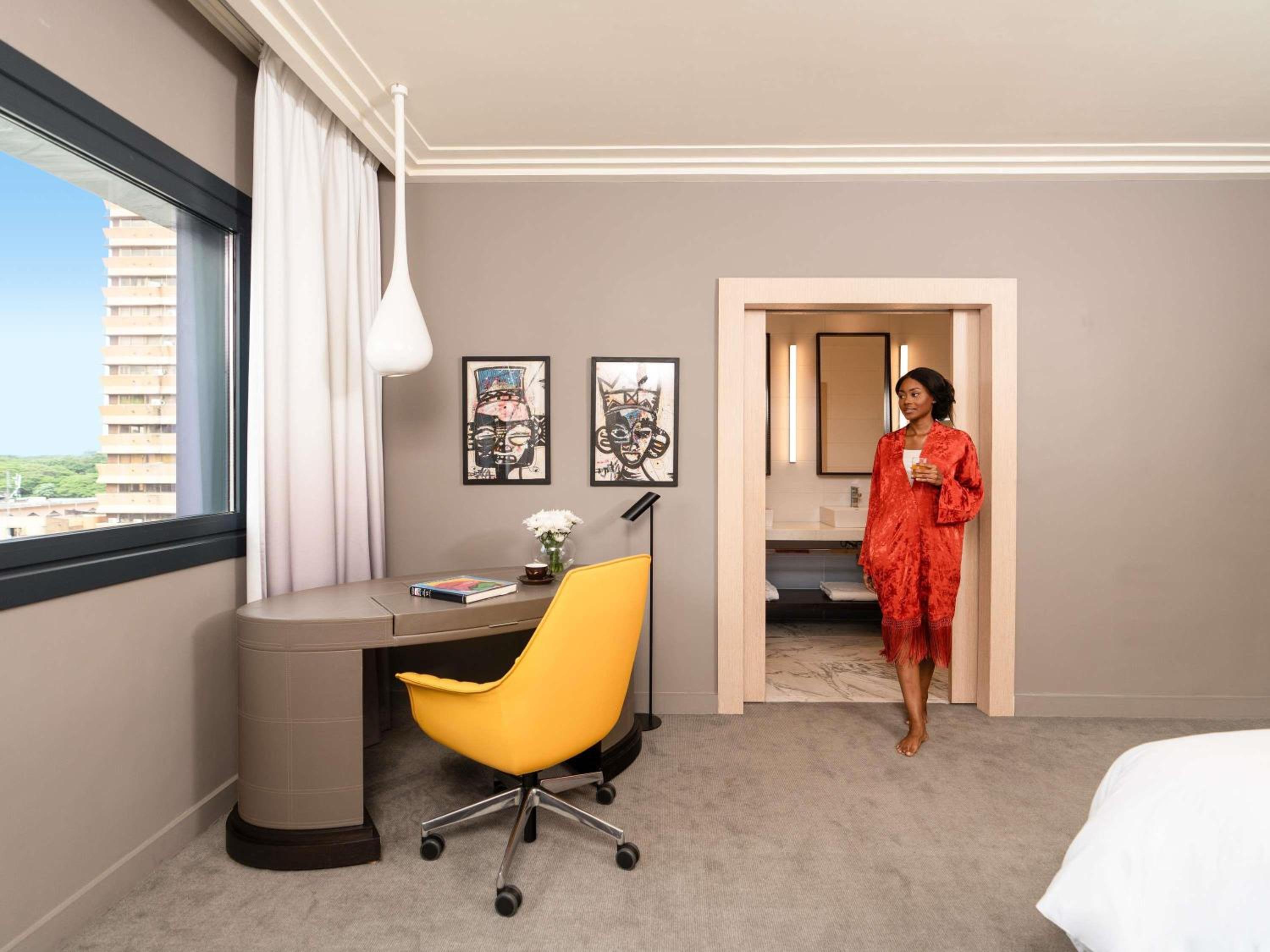 Deluxe Room with One Double and One Single Bed