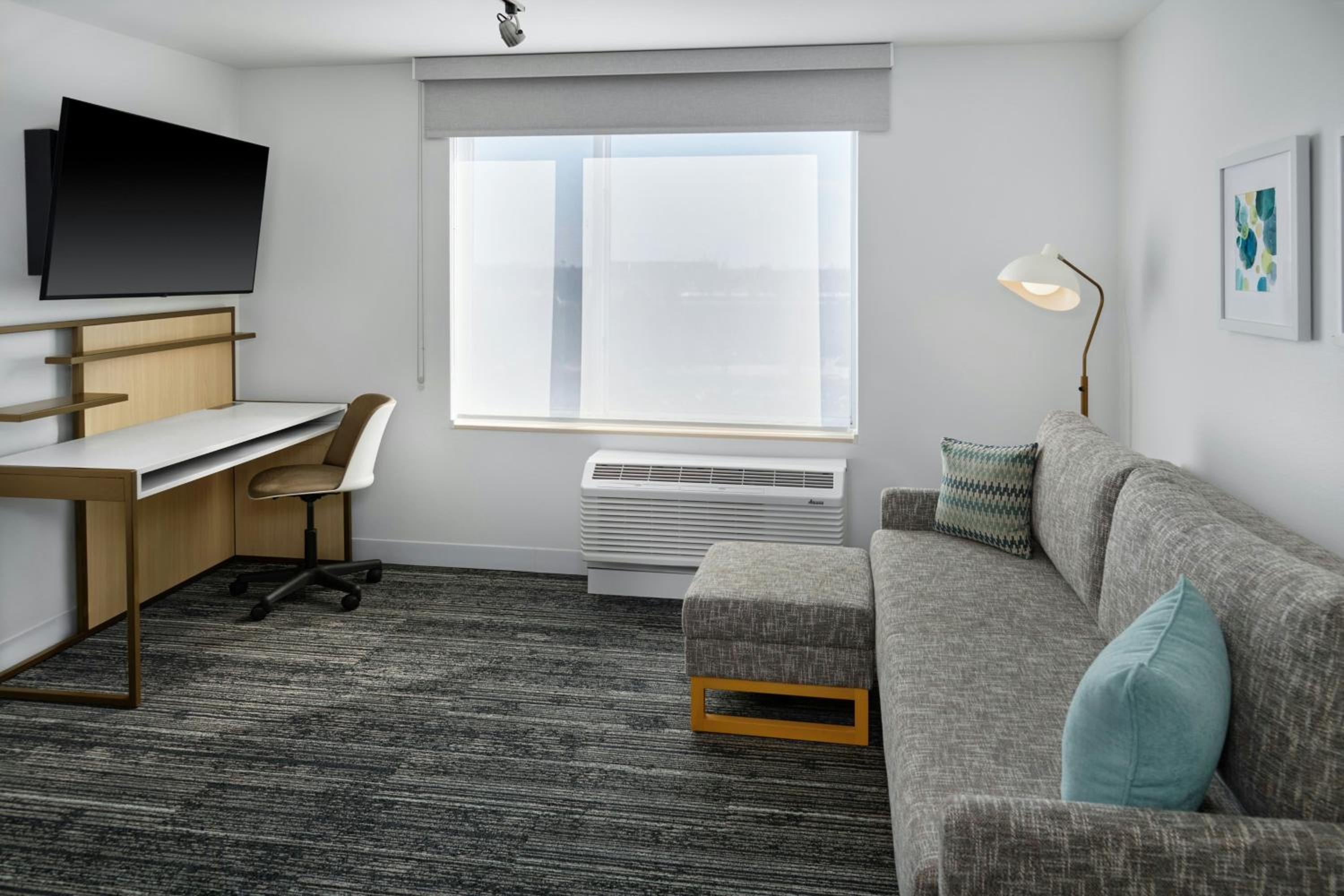 One-Bedroom King Suite with Sofa Bed and Roll-in Shower - Mobility and Hearing Accessible