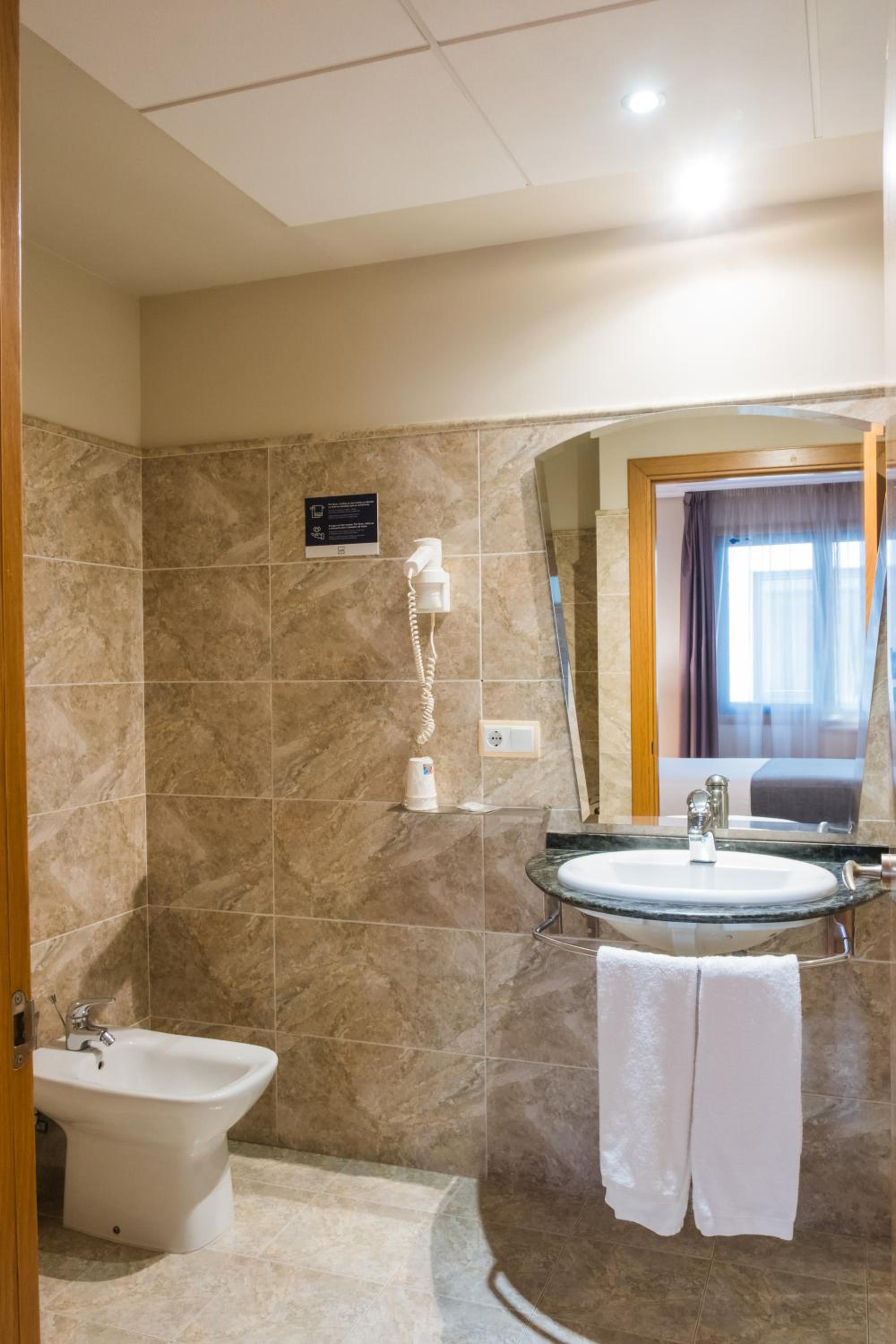 Triple Room - Photo 1
