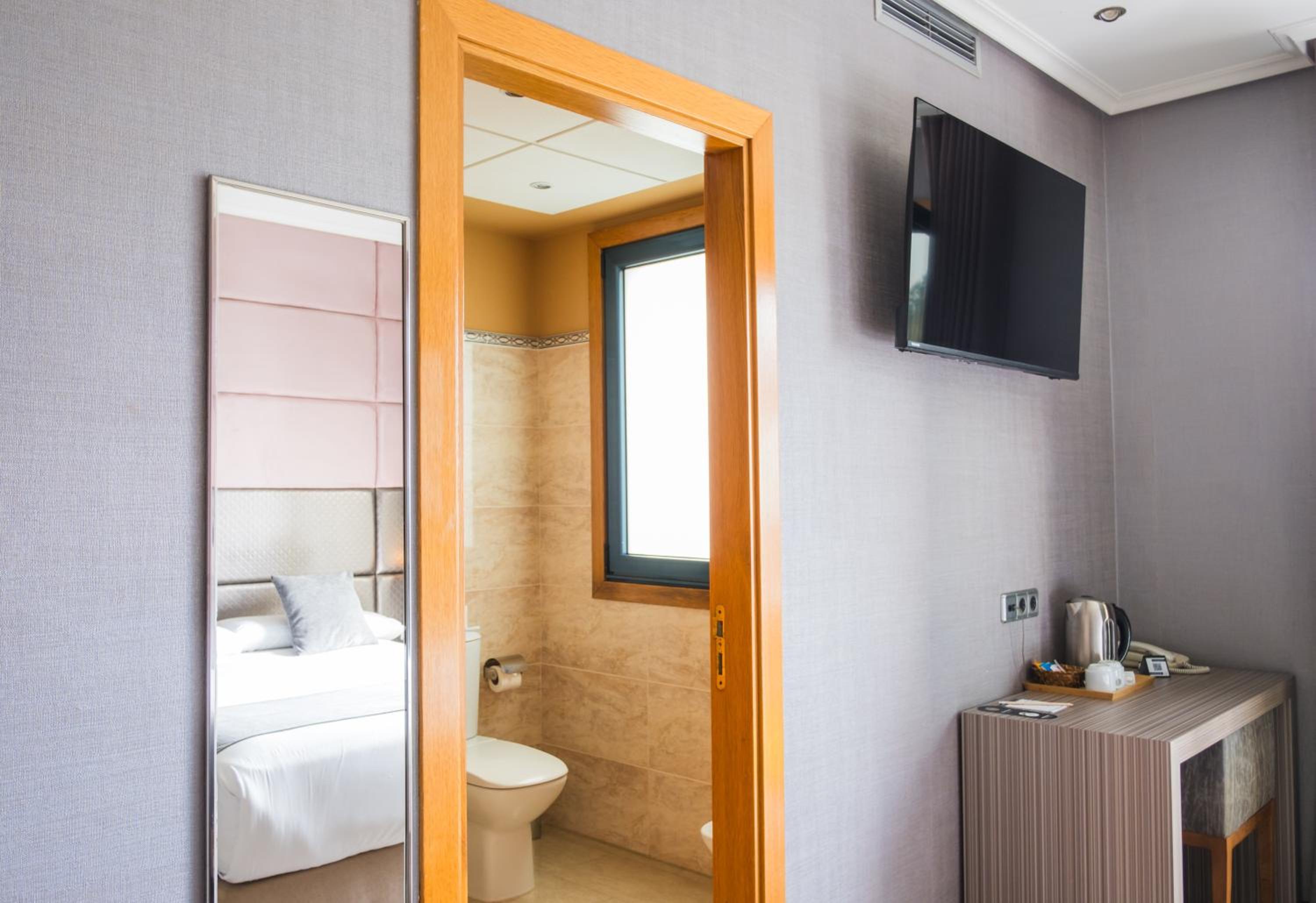 Deluxe Double Room with Balcony - Photo 2