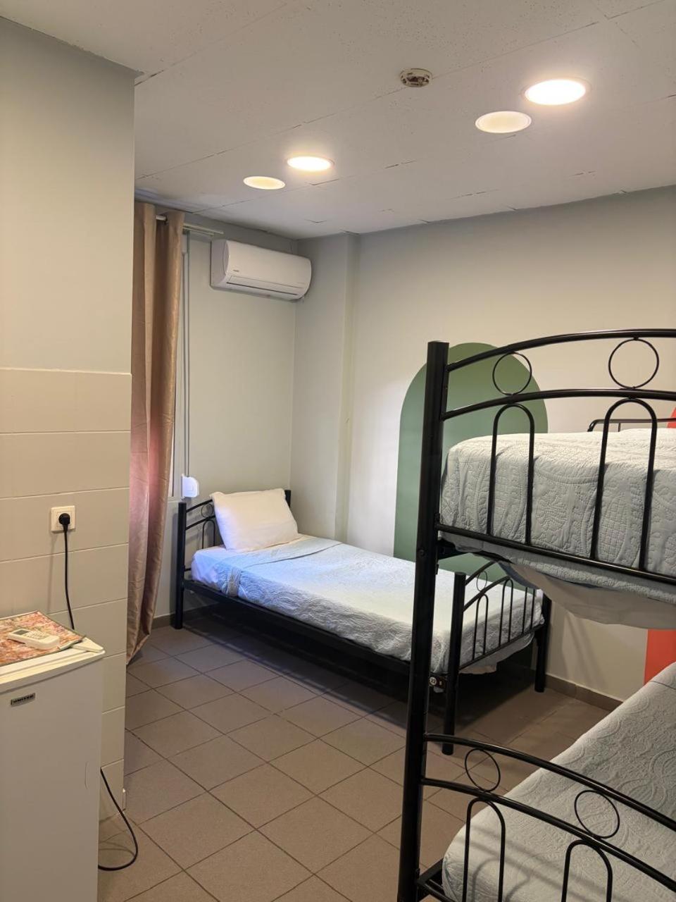 Single Bed in Male Dormitory Room photo 1