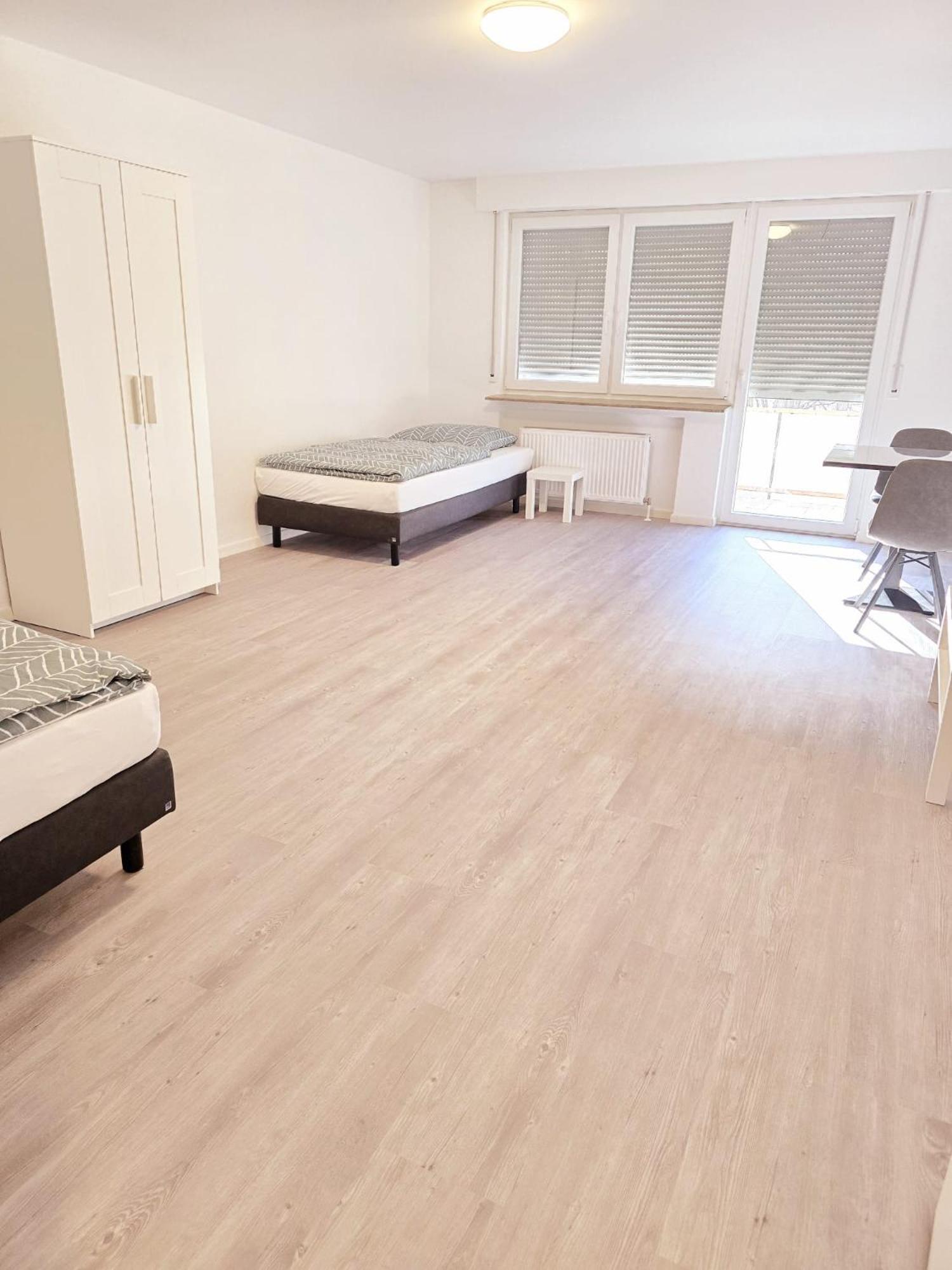 Three-Bedroom Apartment with Balcony photo 2