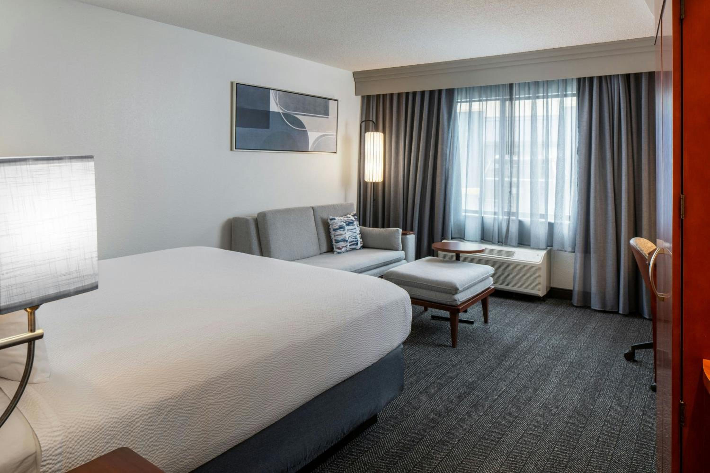 King Room with Sofa Bed and Transfer Shower - Mobility and Hearing Accessible