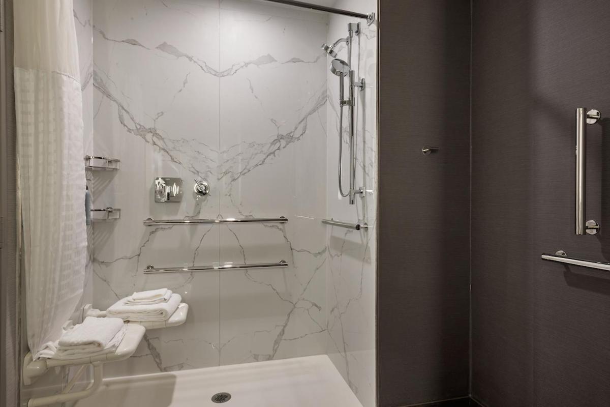 One-Bedroom King Suite with Sofa Bed and Roll-In Shower - Limited View/Mobility and Hearing Accessible