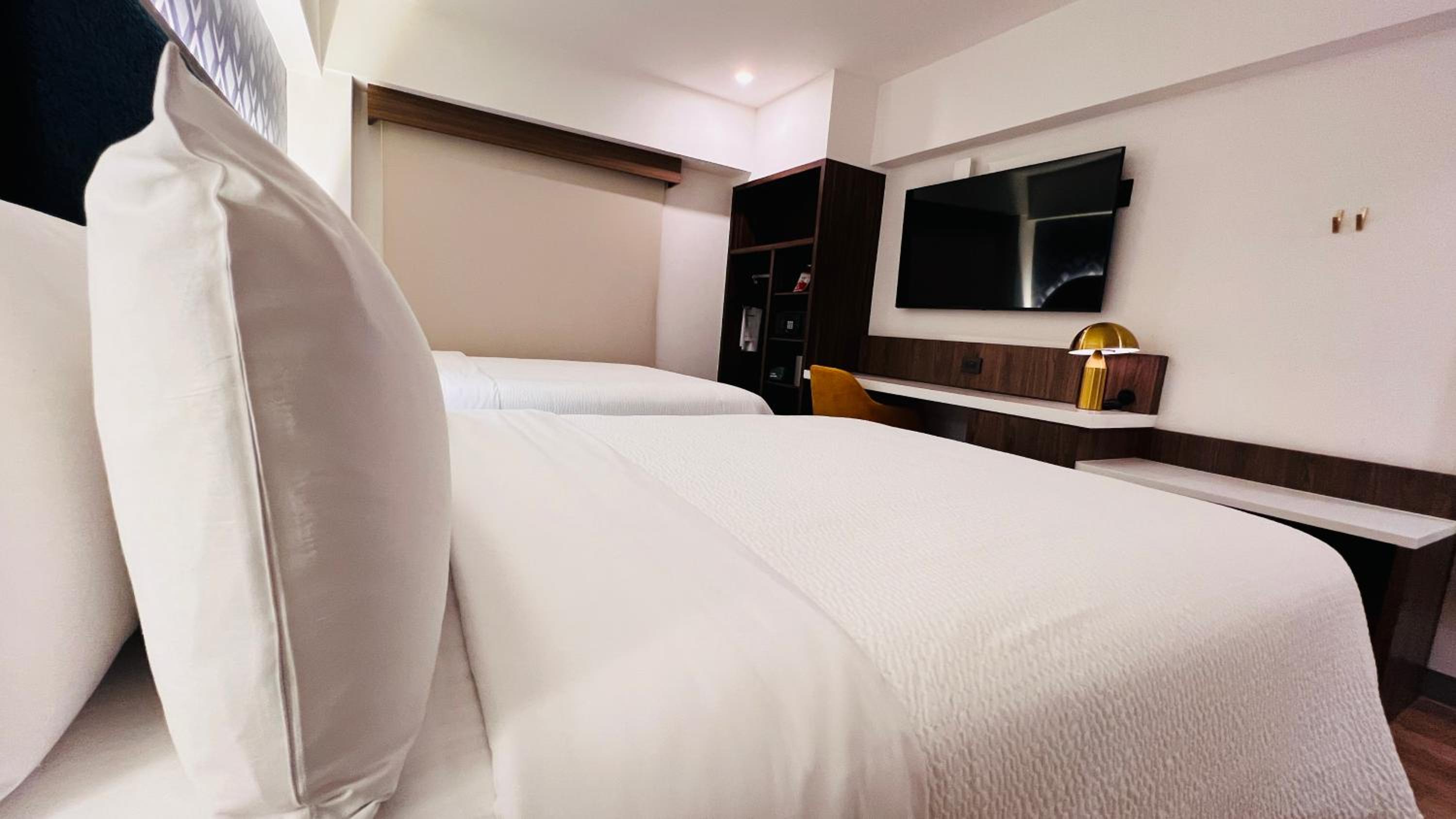 Standard Room with Two Queen Beds - Photo 2