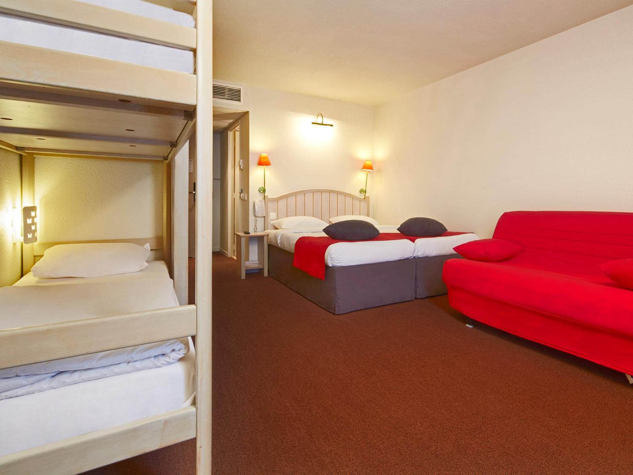 Standard Twin Room with 1 Sofa Bed and 2 Bunk Beds - Photo 1