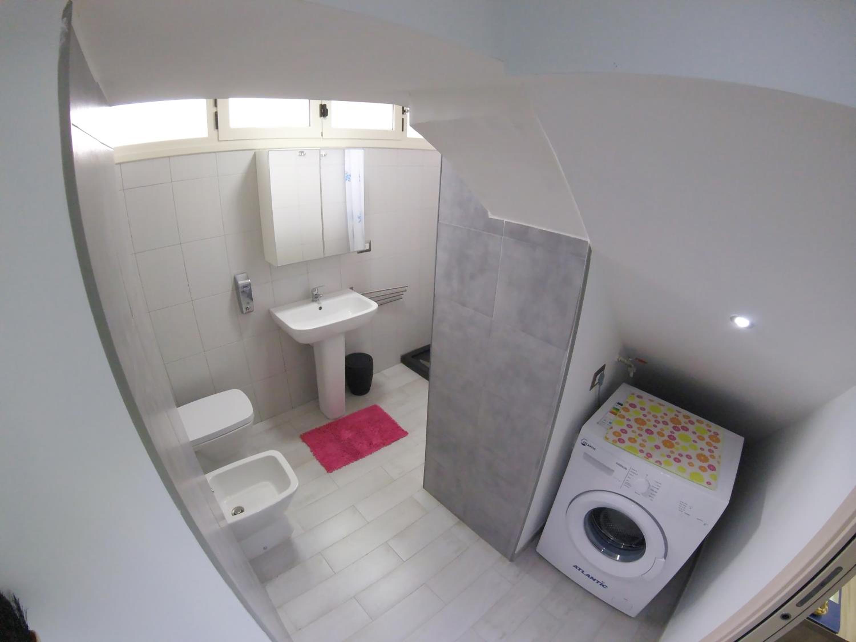 Three-Bedroom House - Photo 16