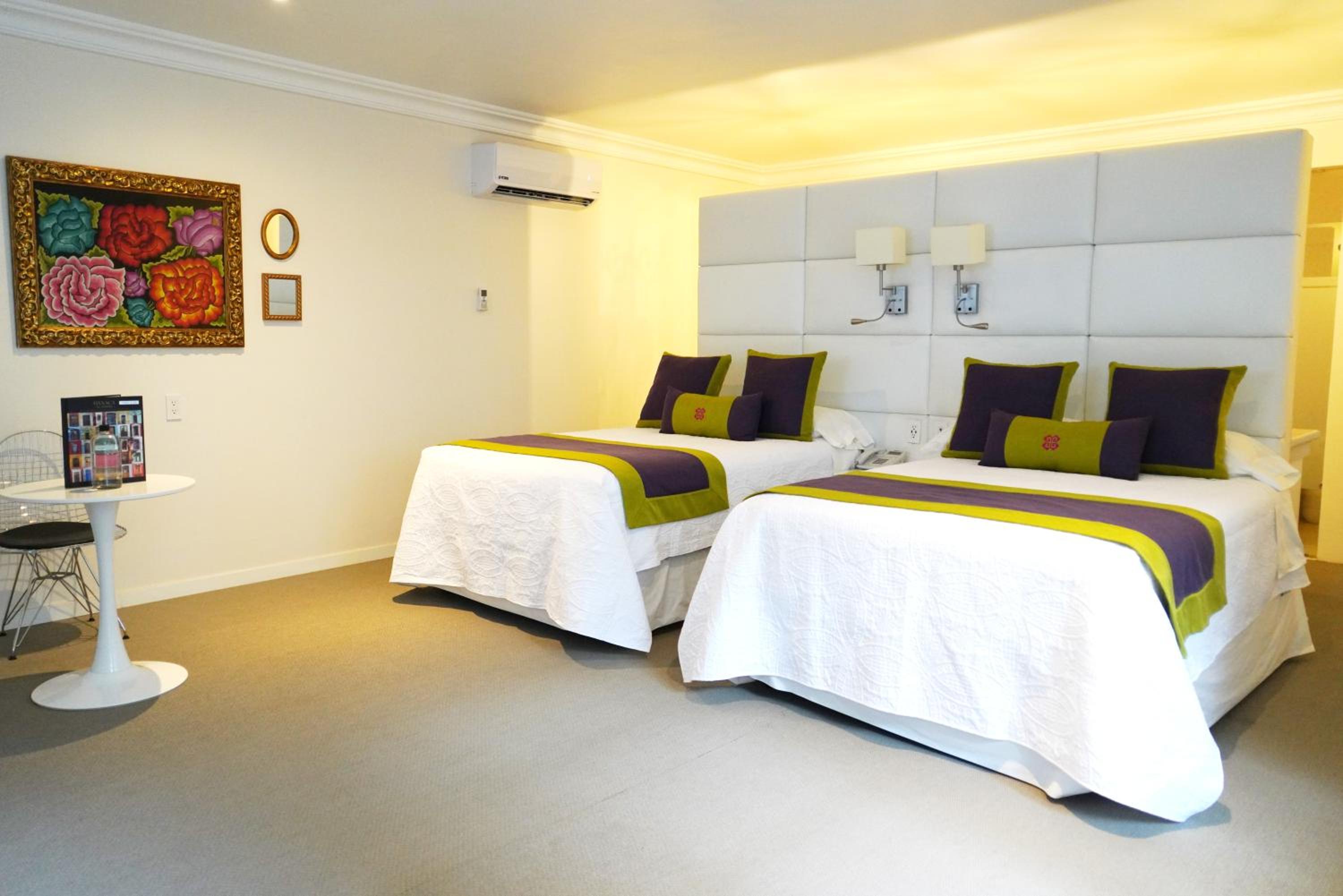 Deluxe Queen Room with Two Queen Beds photo 2