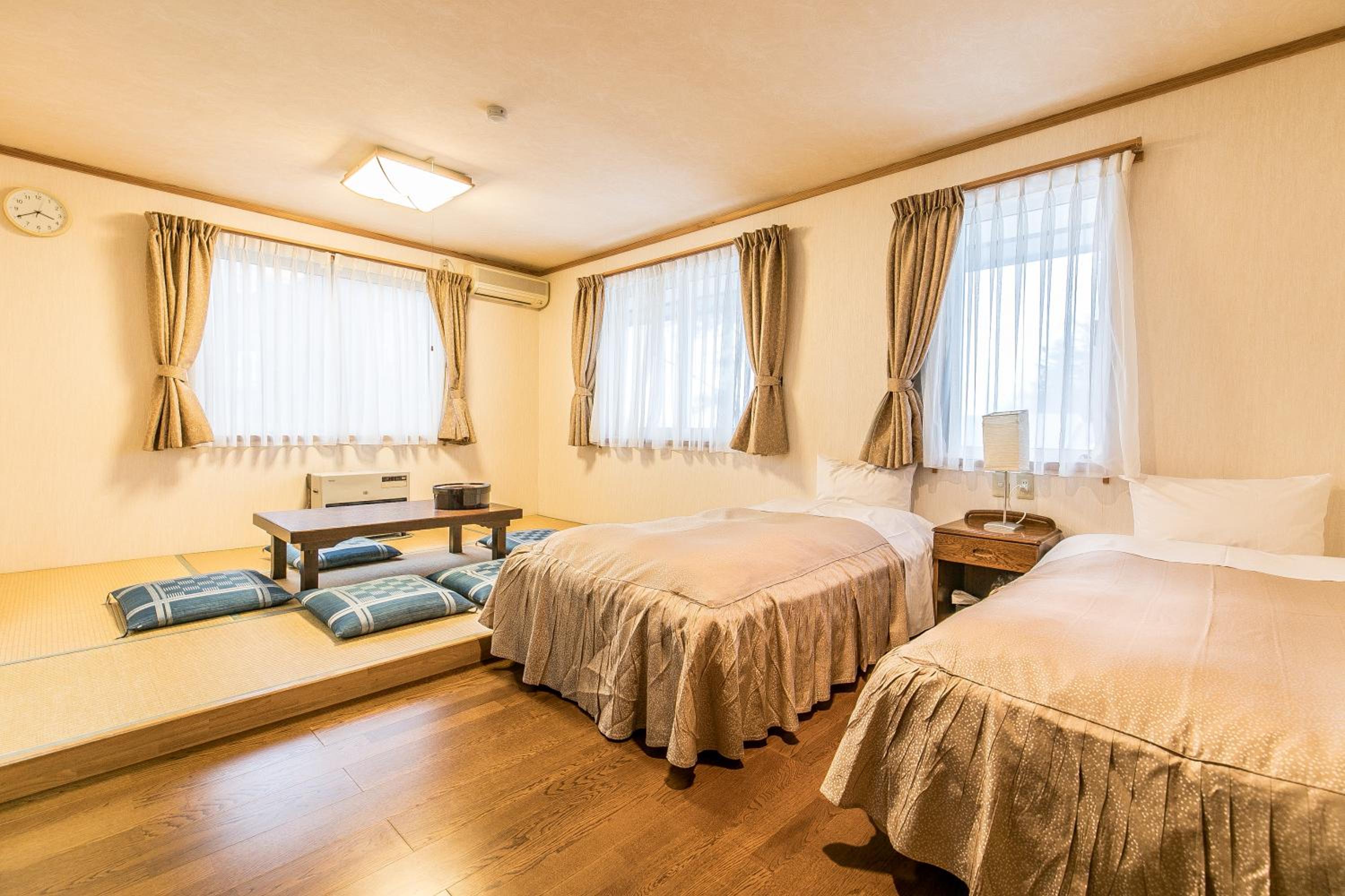 Quadruple Room with Private Bathroom