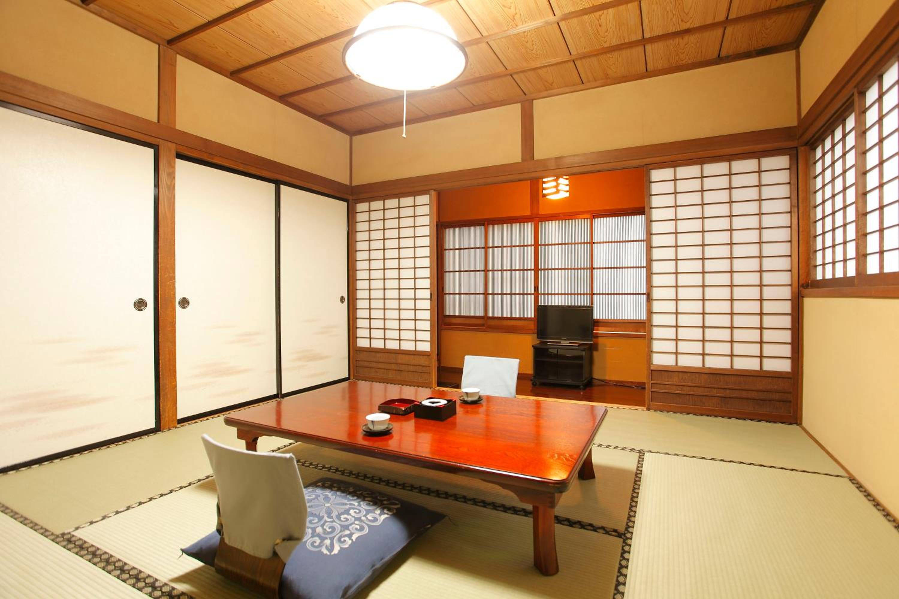 Japanese-Style Family Room with Shared Bathroom