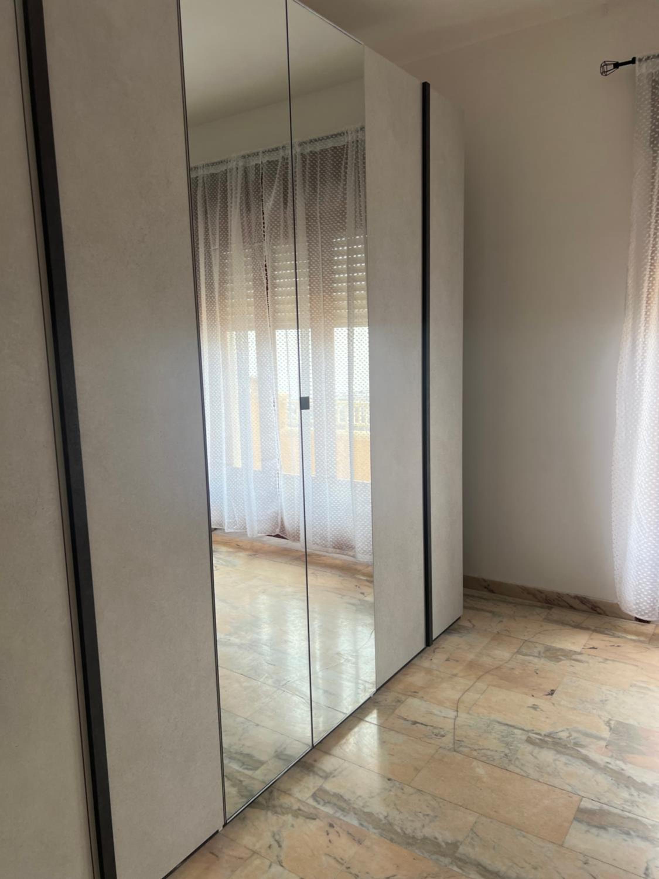 Three-Bedroom Apartment with Balcony photo 3