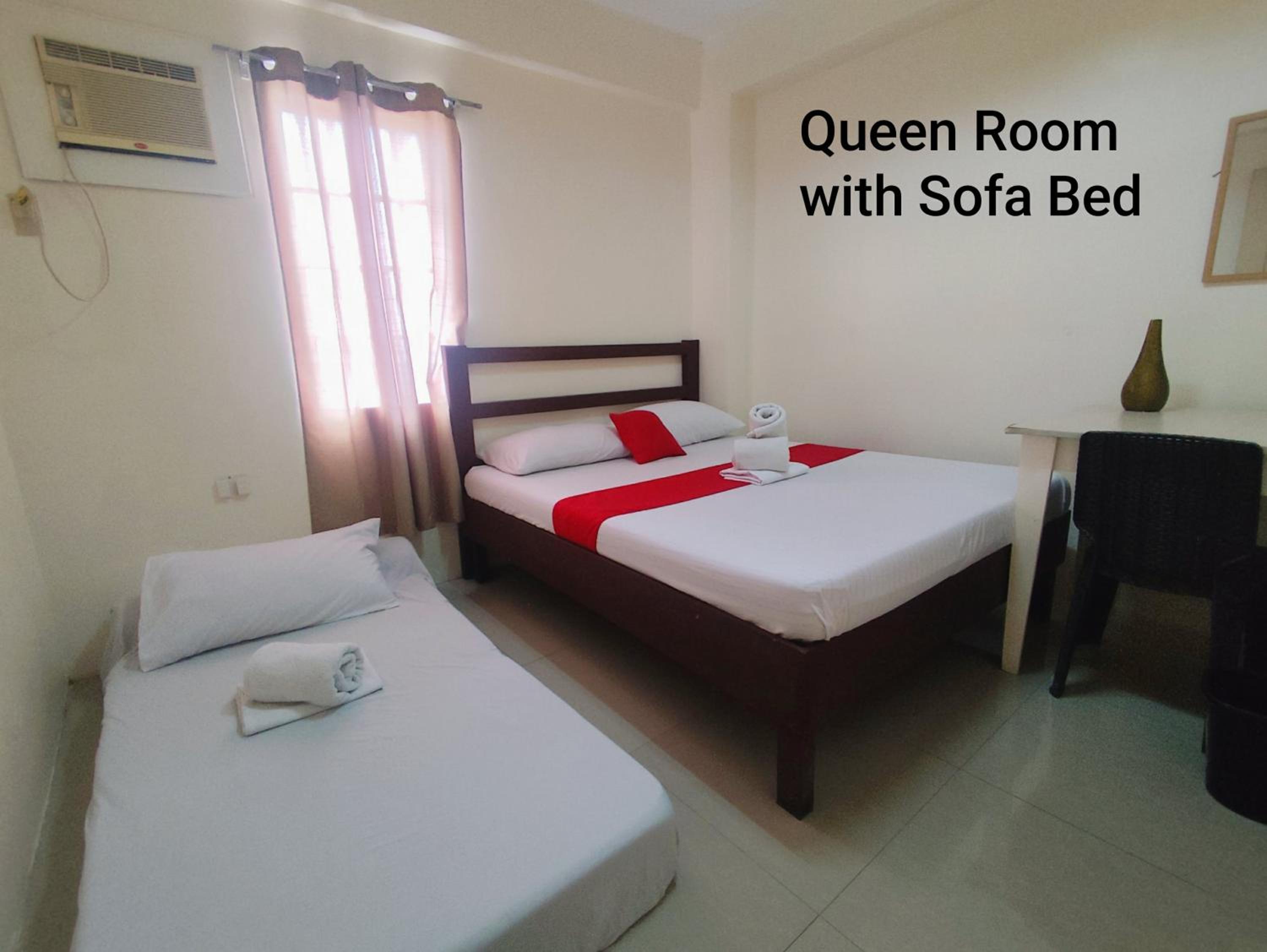 Queen Room with Shared Bathroom