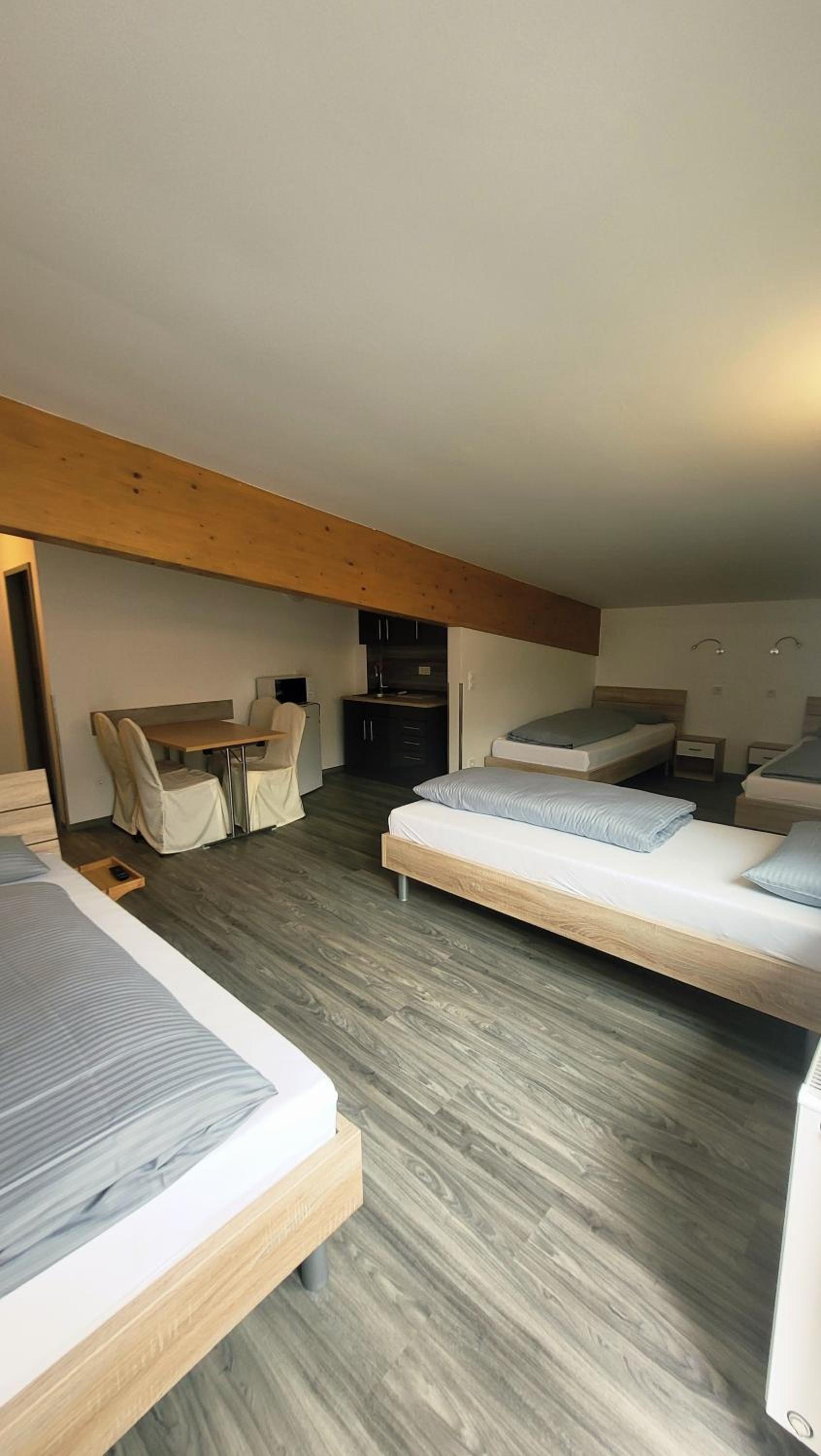 Quadruple Room with Private Bathroom photo 1