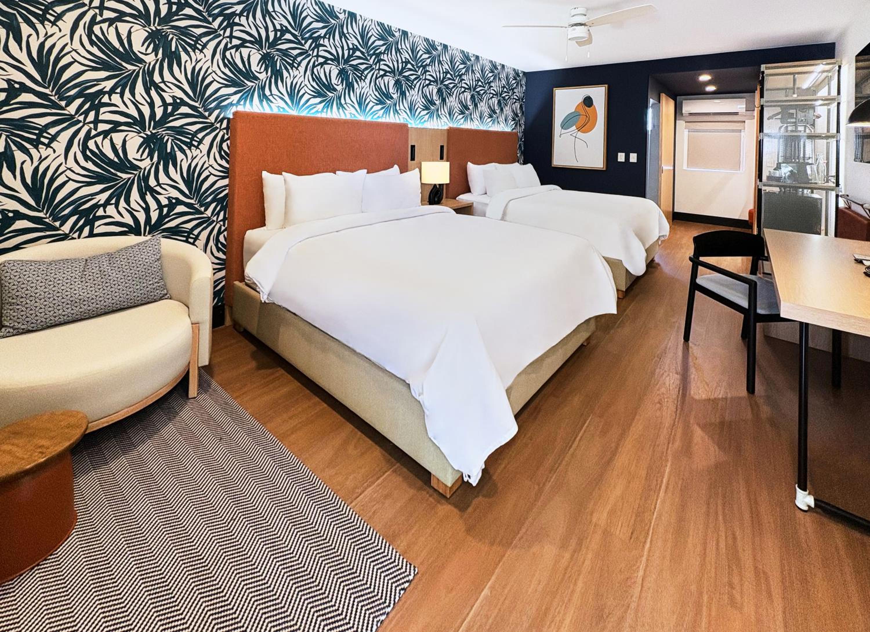 Premium Queen Room with Two Queen Beds - Photo 3