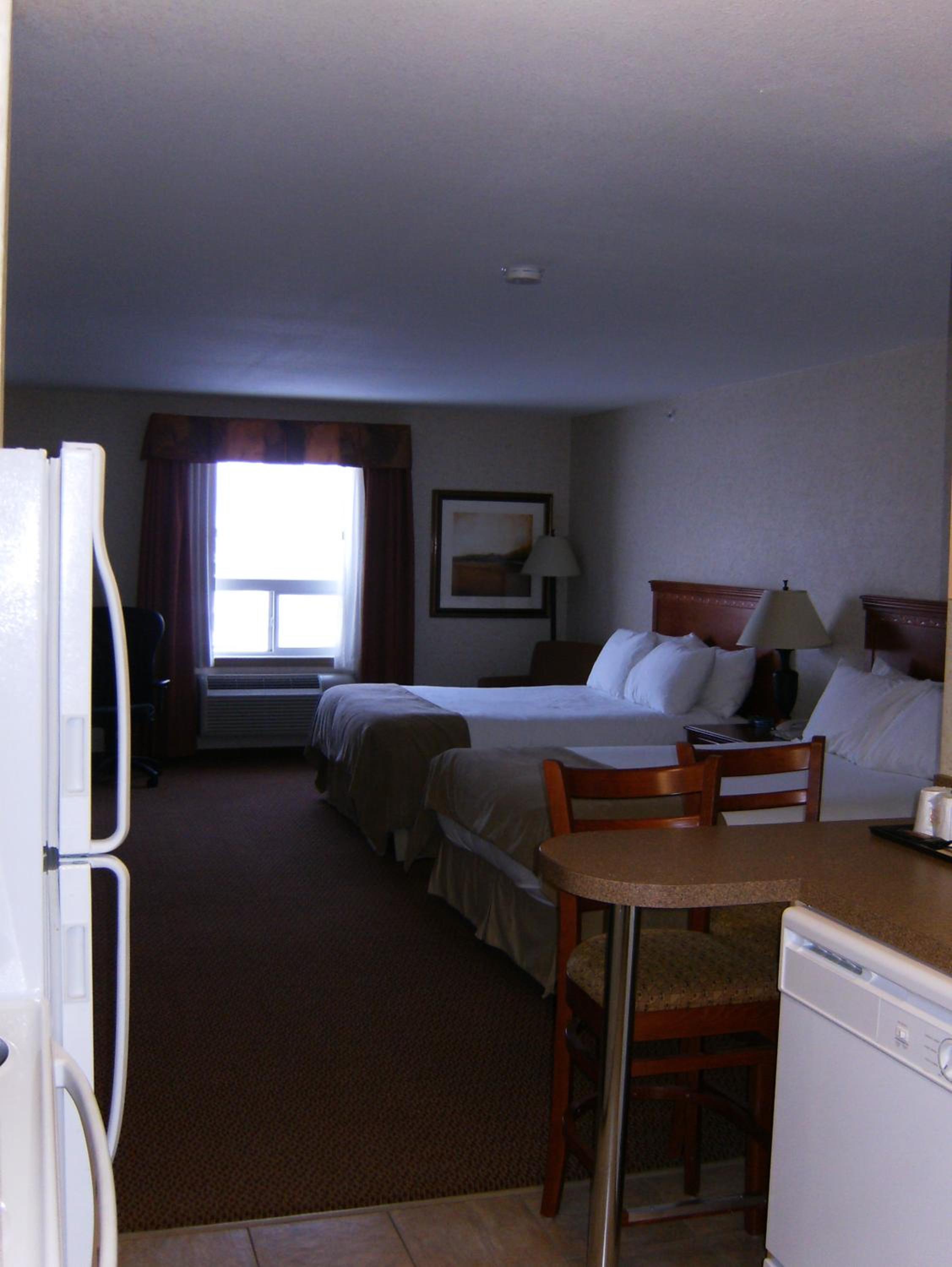 Queen Room with Two Queen Beds and Kitchen - Non-Smoking - Photo 1