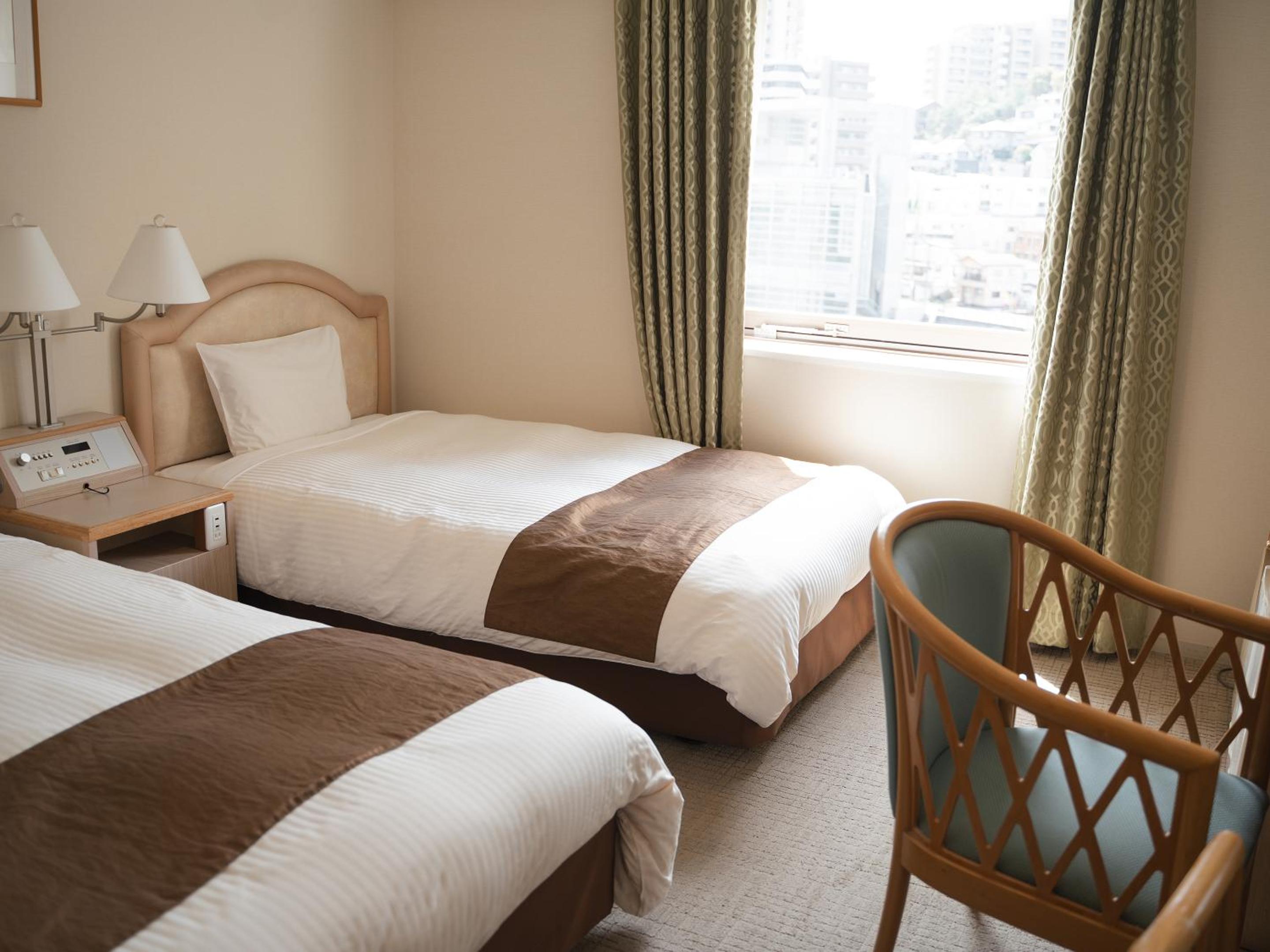 Standard Twin Room - Photo 7