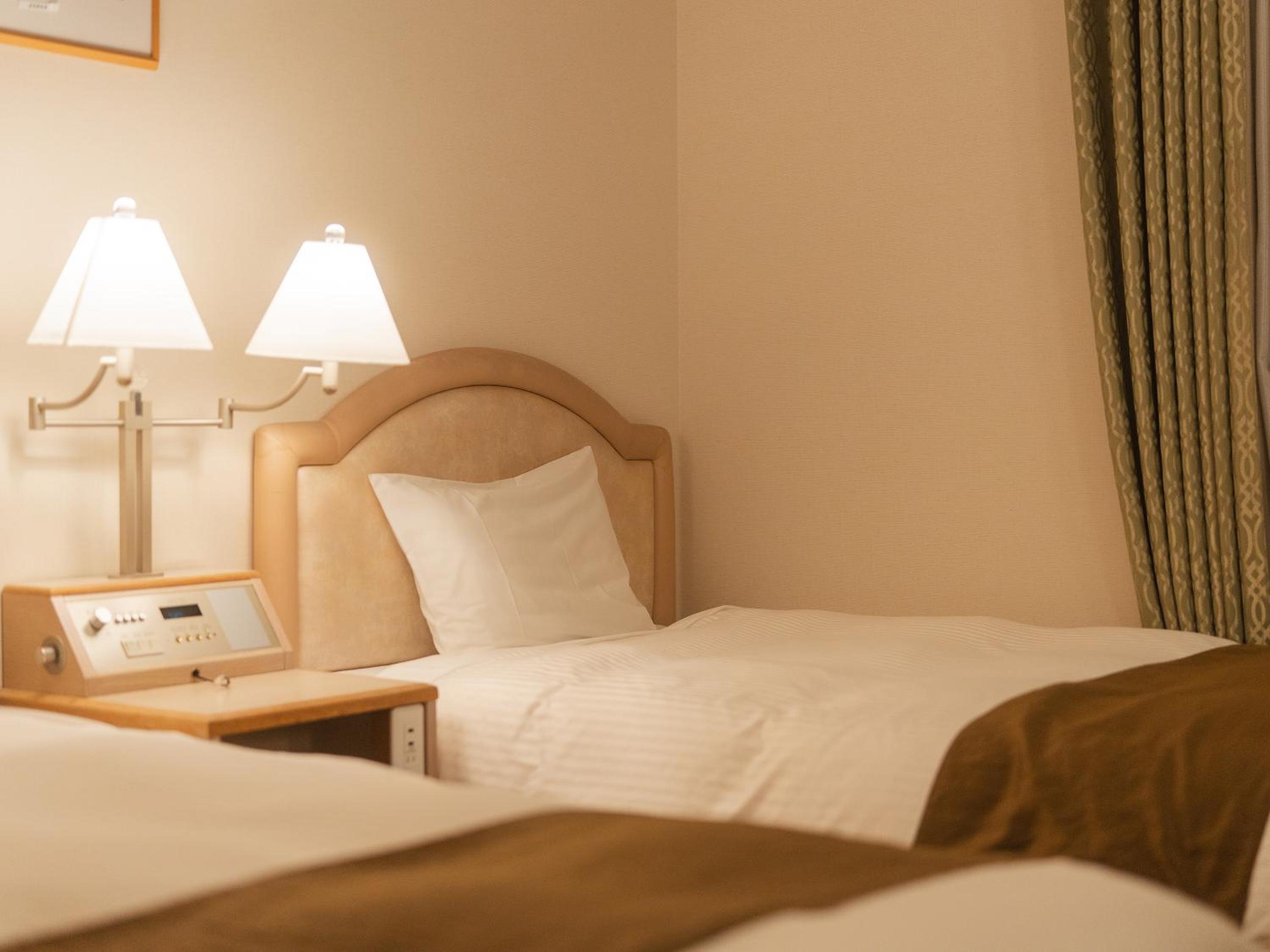 Standard Twin Room - Photo 5