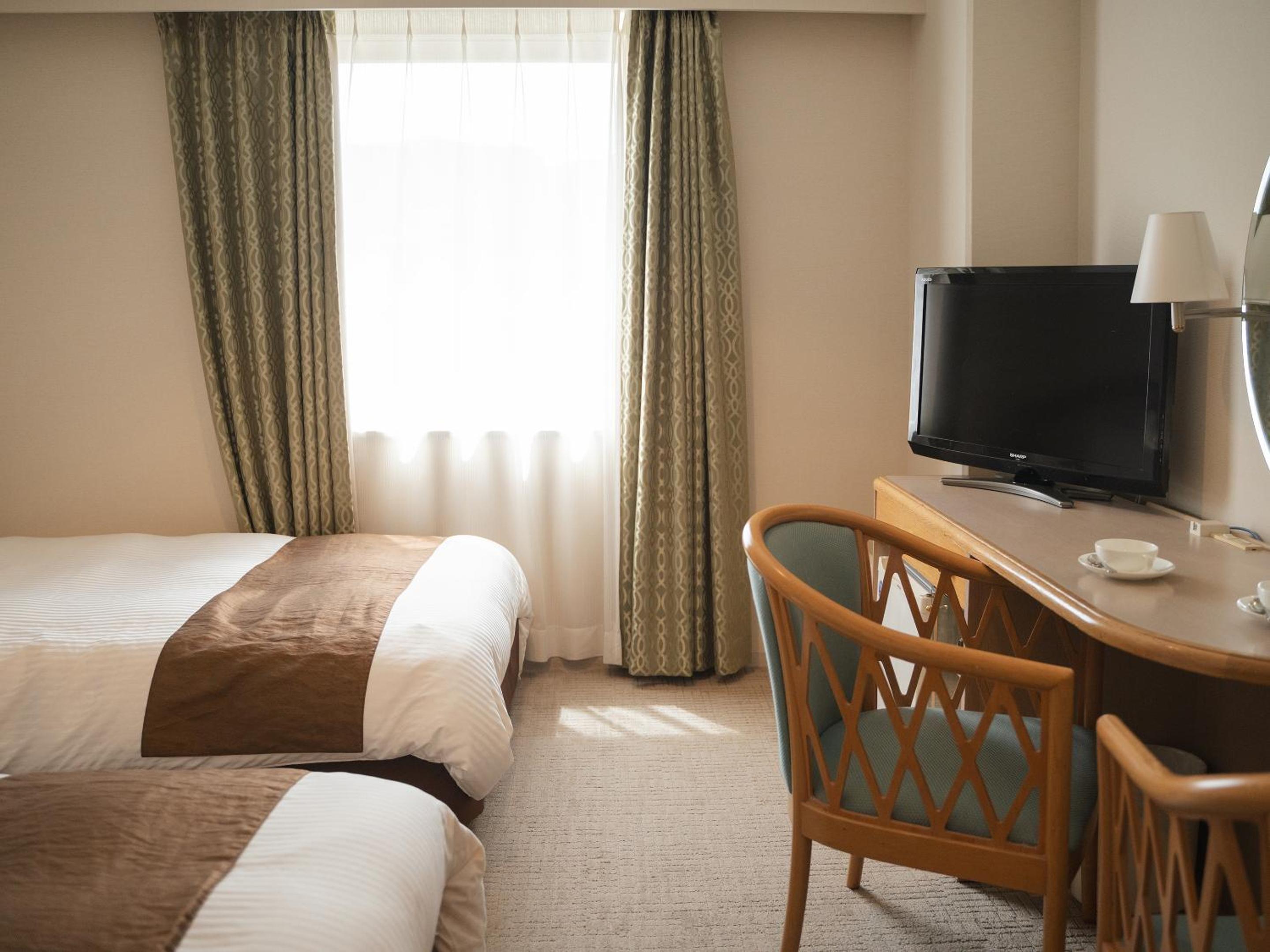 Standard Twin Room - Photo 4