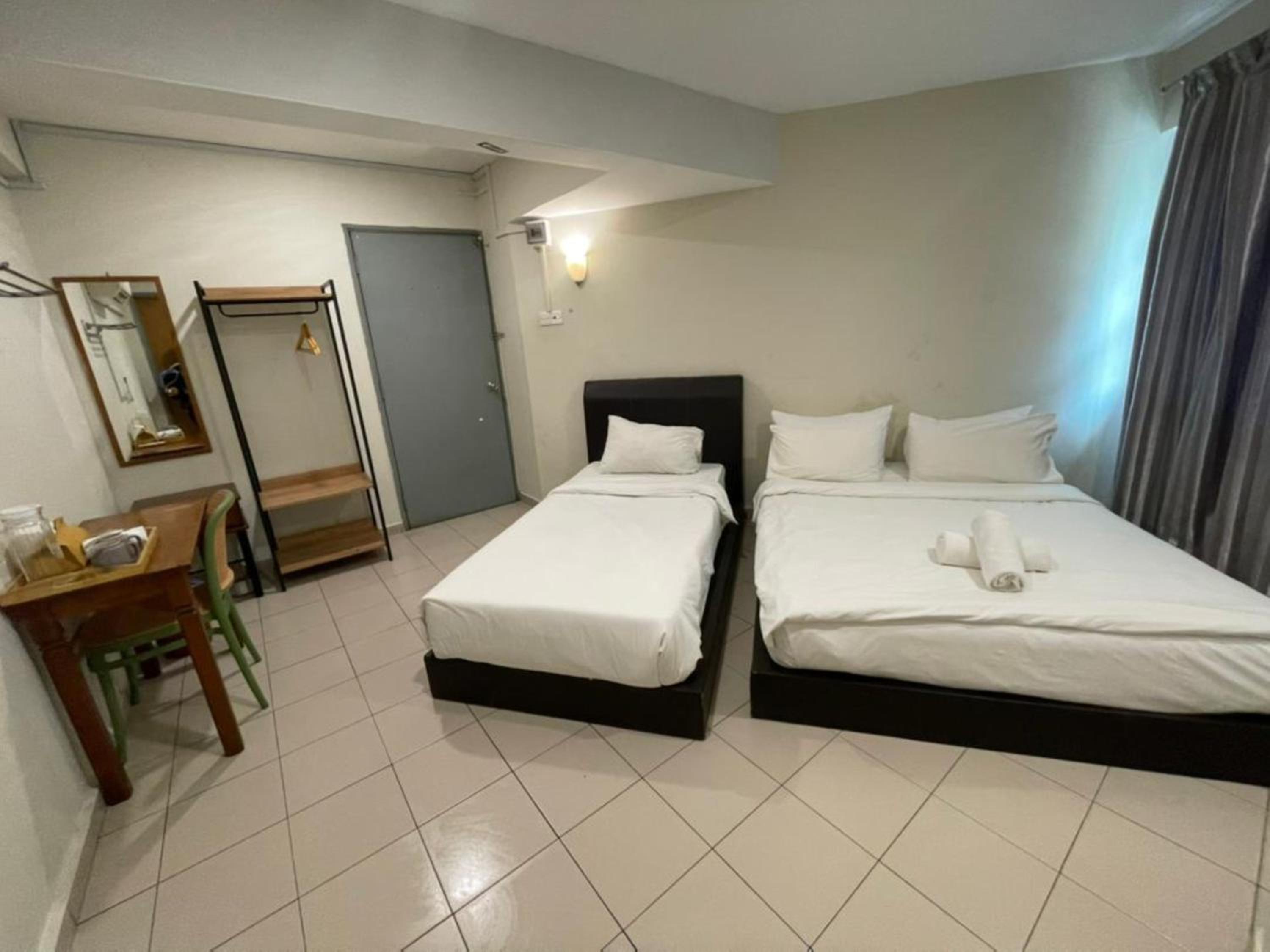 Deluxe Triple Room - Photo 2