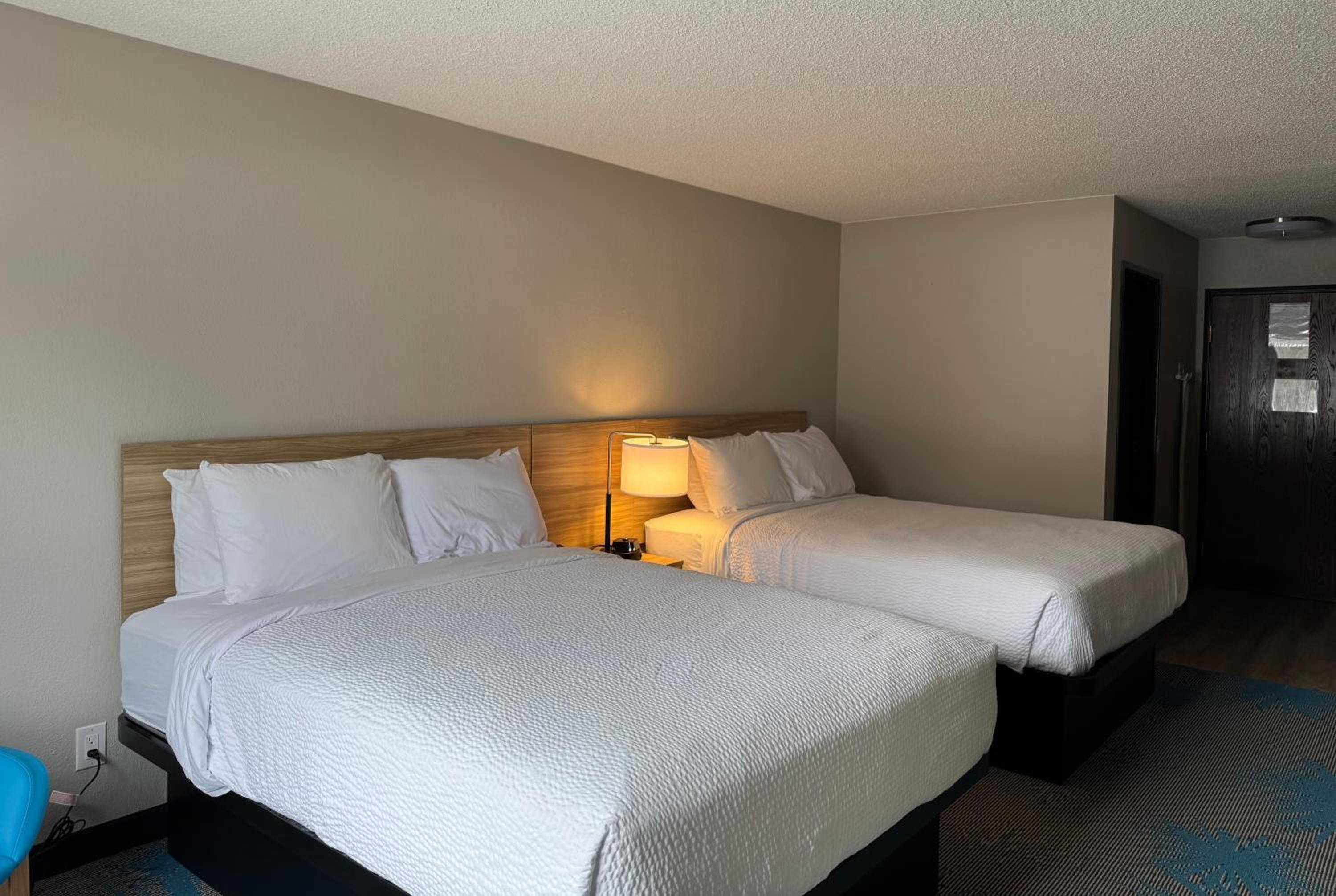 Queen Room with Two Queen Beds and Shower Only - Non-Smoking