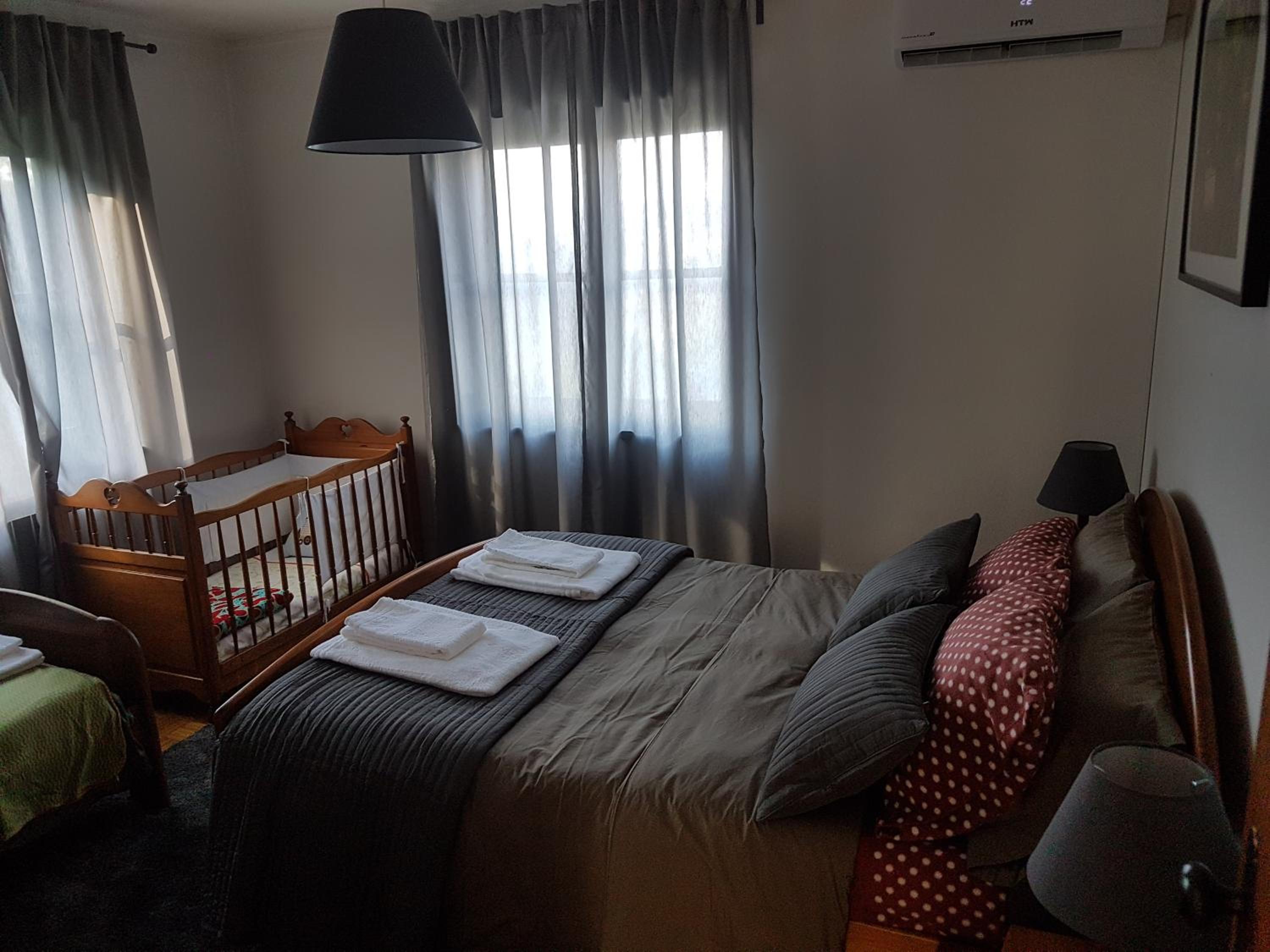 Three-Bedroom House - Photo 26