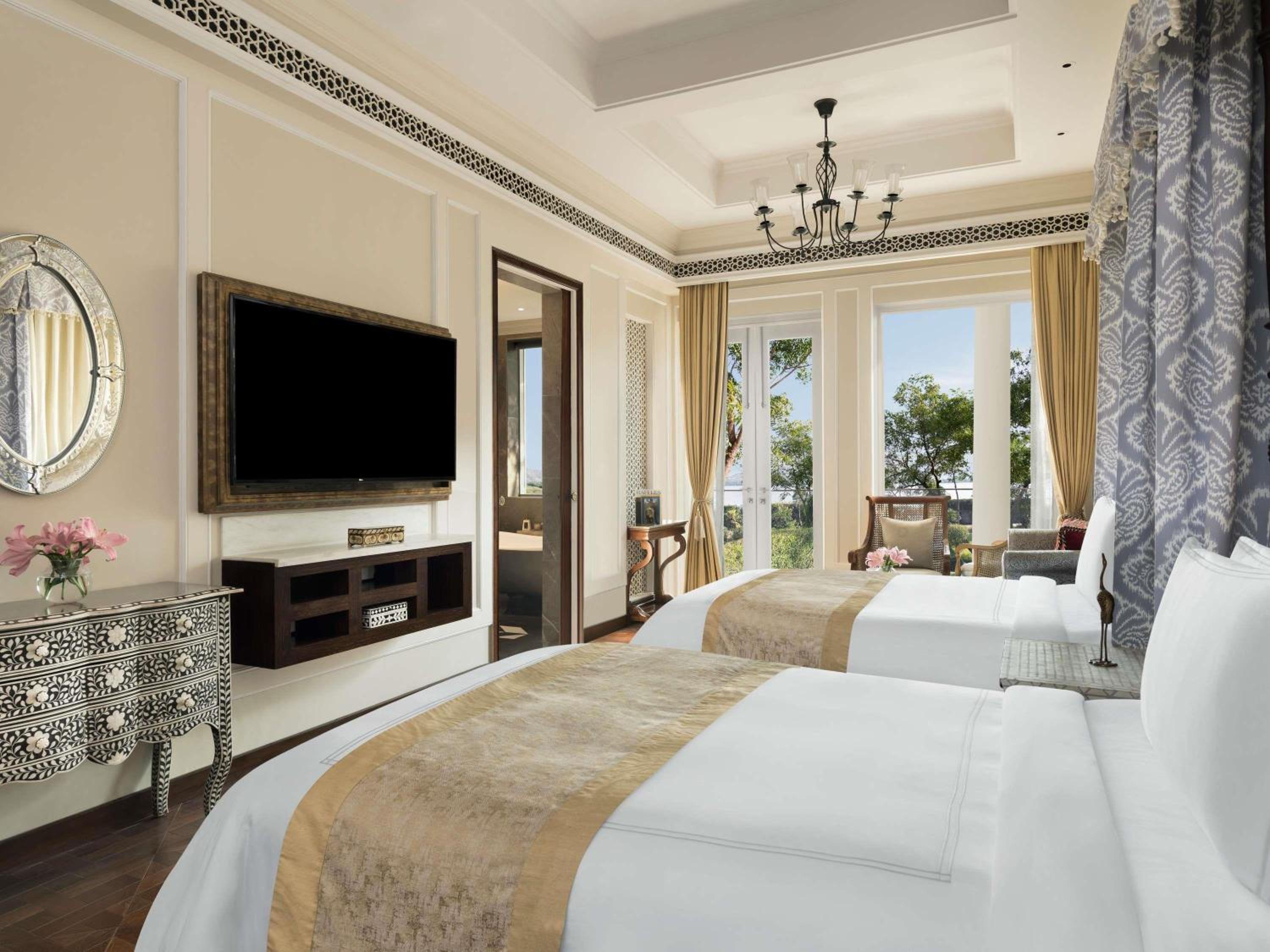 Flamingo Signature Room with Garden Twin Bed:15% off on F&B, Spa | soulful yoga| Morning & Evening Aarti | traditional & nature led experiences such as daily tea, curated walks, bird watching, Prana Garden, Rajasthani folk dance, Pottery, Mehendi and more