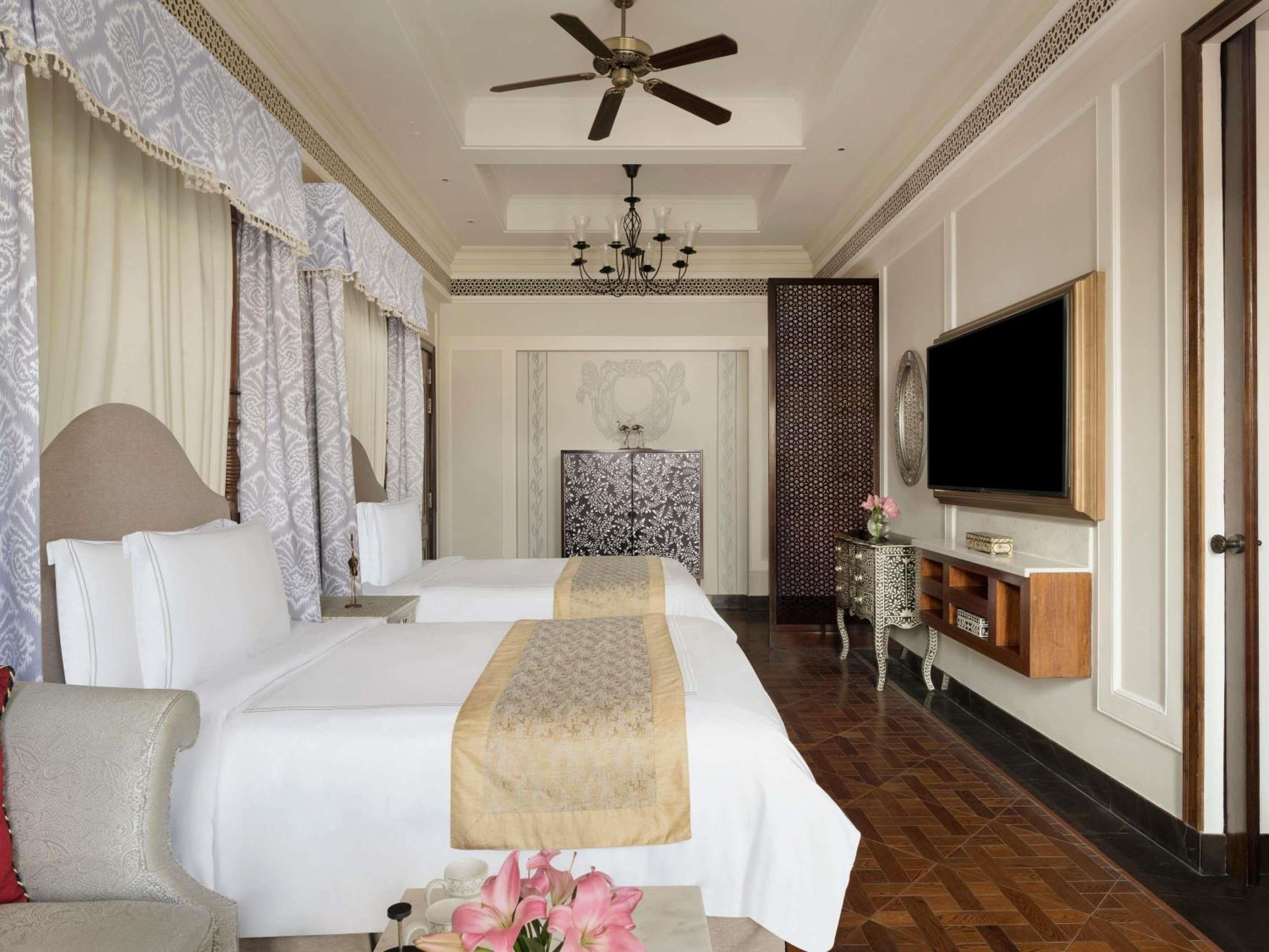 Flamingo Signature Room with Garden Twin Bed:15% off on F&B, Spa | soulful yoga| Morning & Evening Aarti | traditional & nature led experiences such as daily tea, curated walks, bird watching, Prana Garden, Rajasthani folk dance, Pottery, Mehendi and more