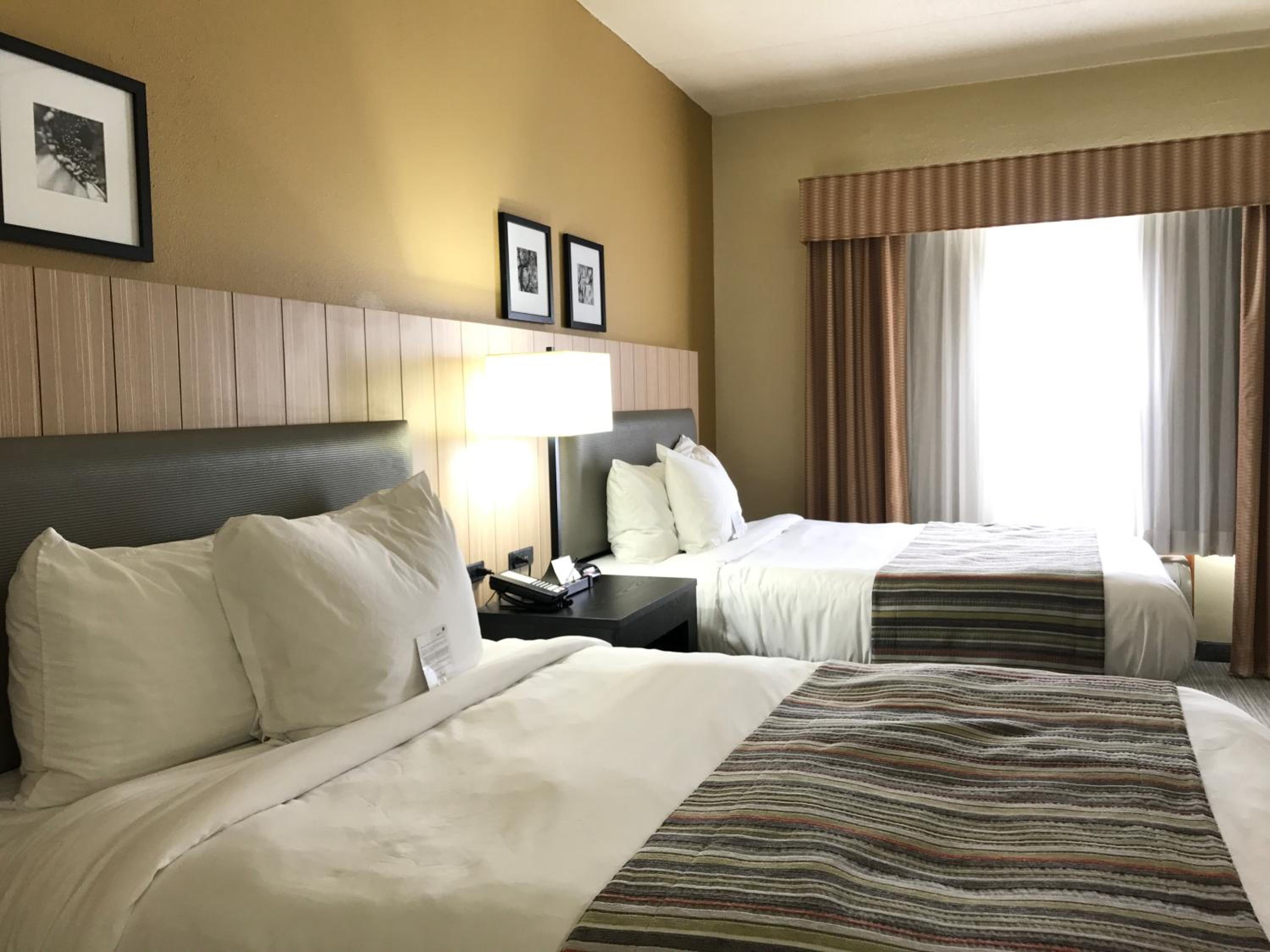 Queen Room with Two Queen Beds - Non-Smoking - Photo 1