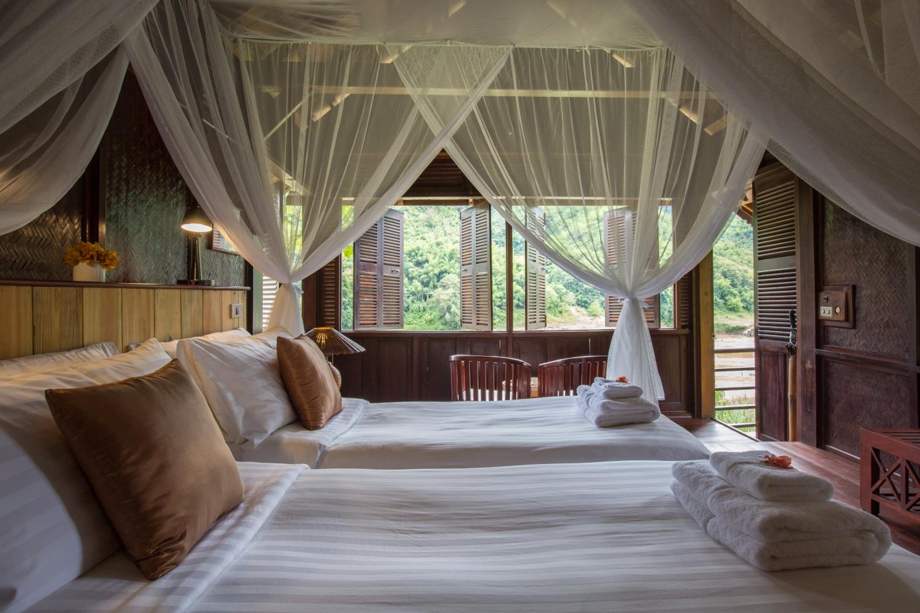 Twin Room (Include boat from PakBeng - Luang Prabang) photo 2