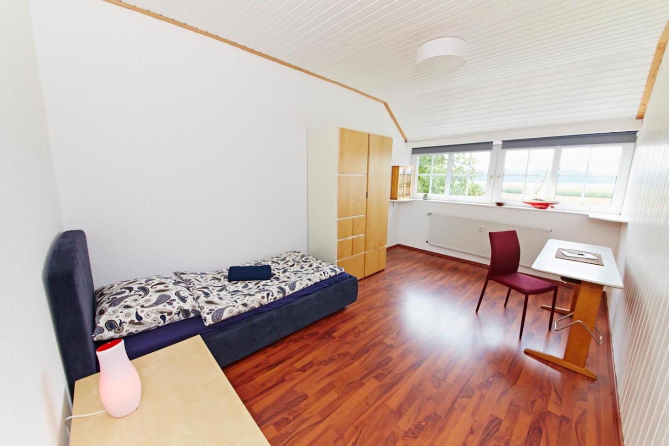 Three-Bedroom Apartment photo 1