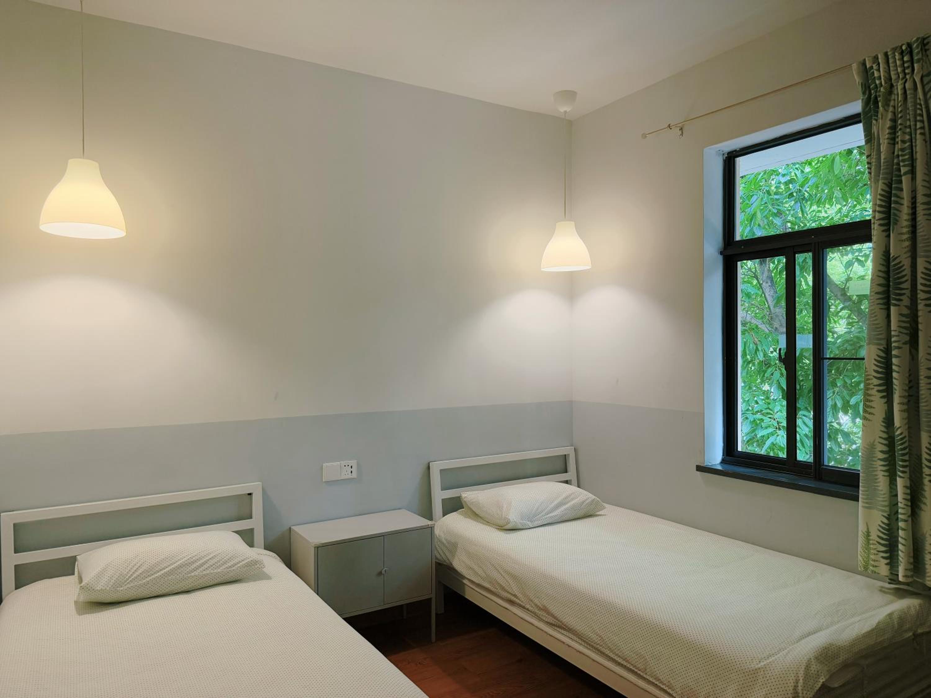 Single Bed in Female Dormitory Room