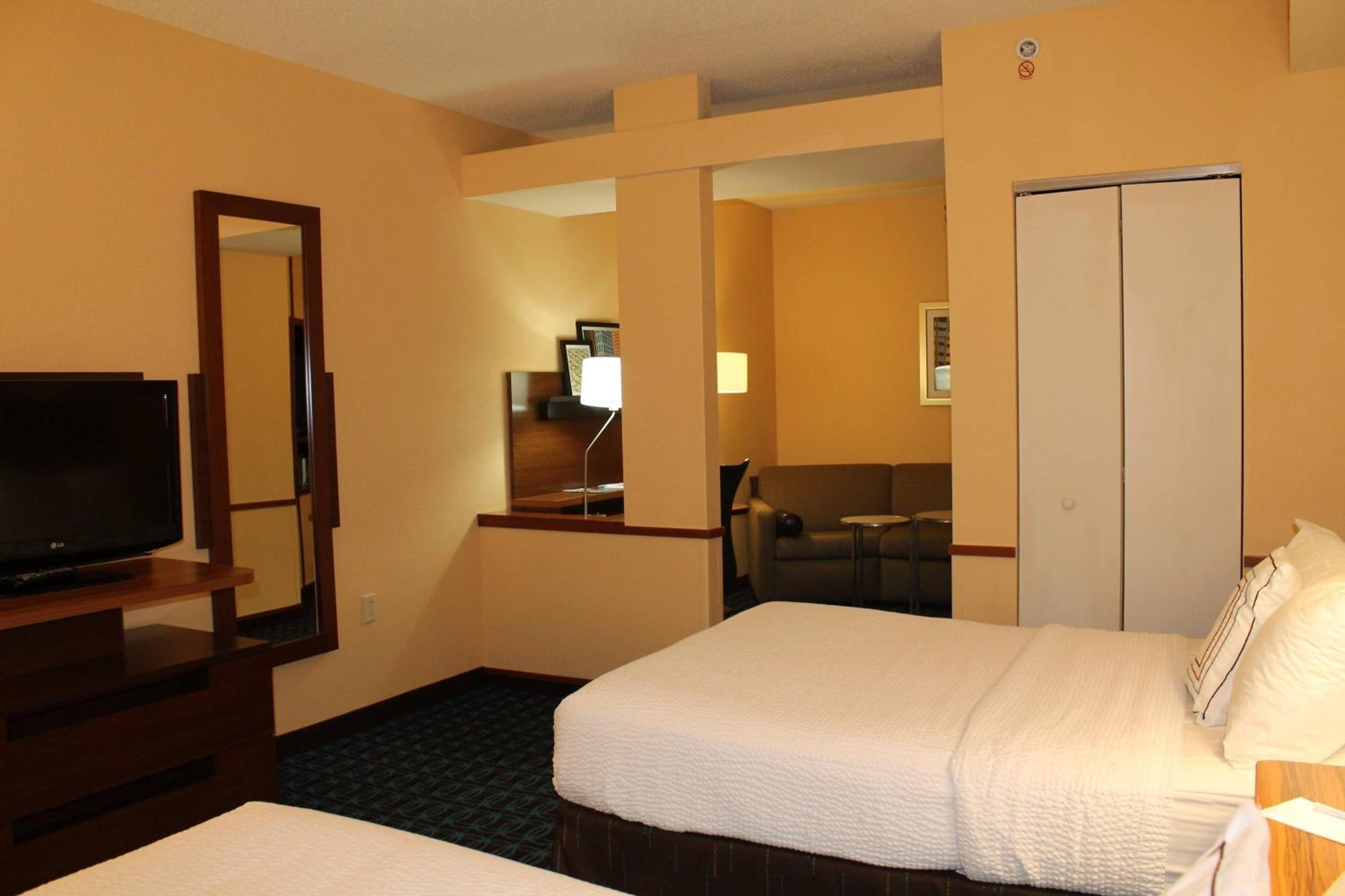 Queen Suite with Two Queen Beds and Sofa Bed - Photo 1
