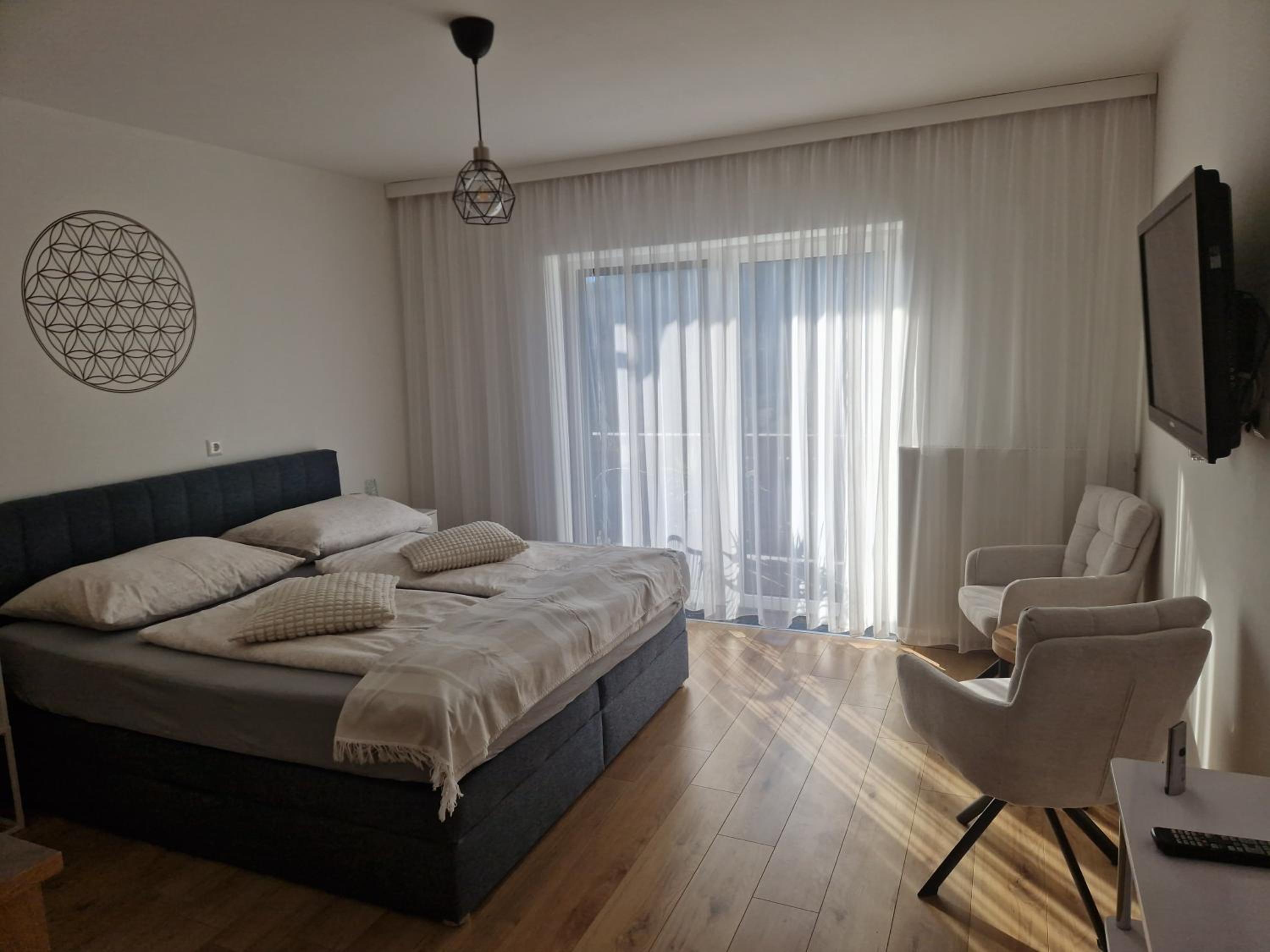 One-Bedroom Apartment with Balcony and Mountain View