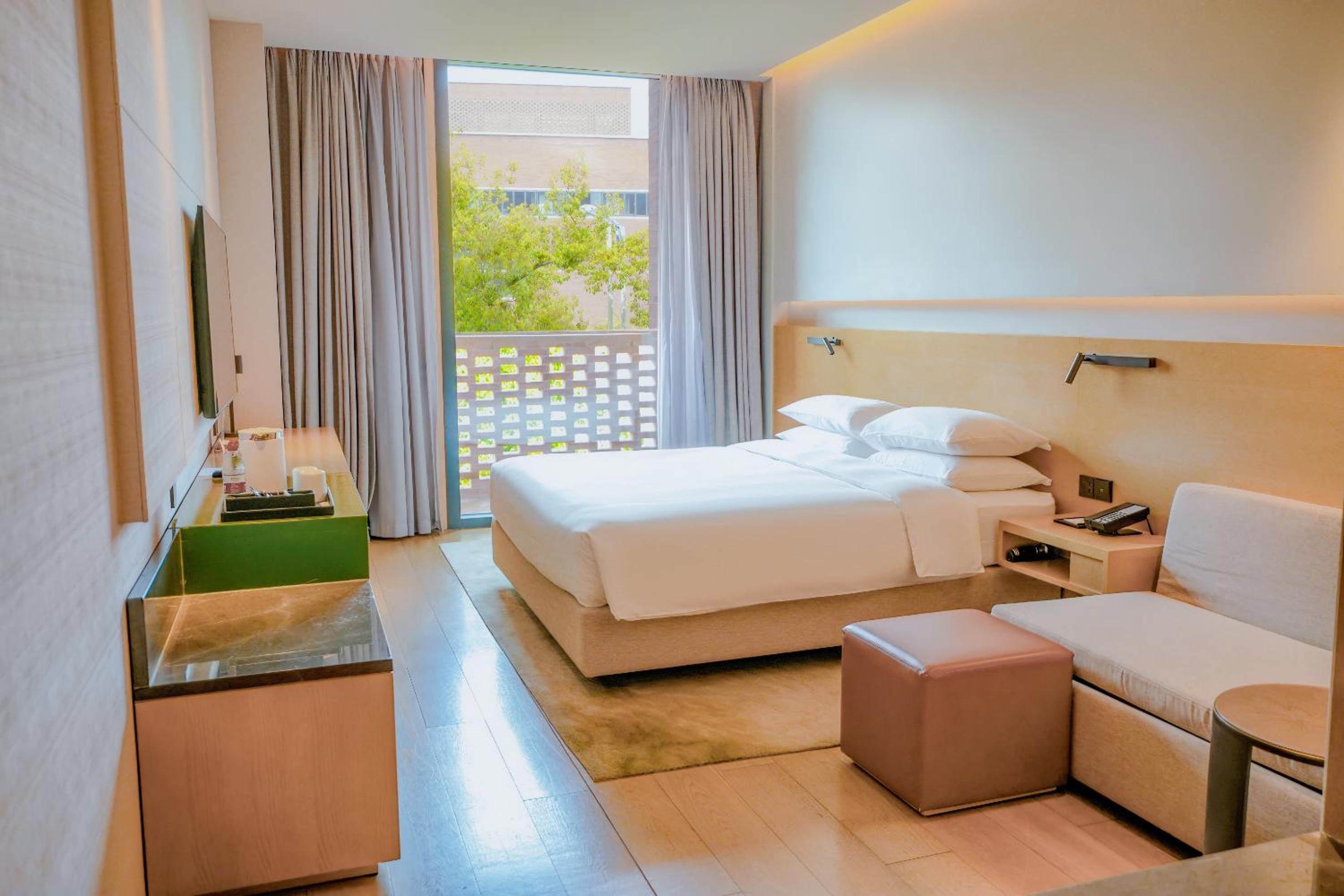 King Room with Balcony and Courtyard View